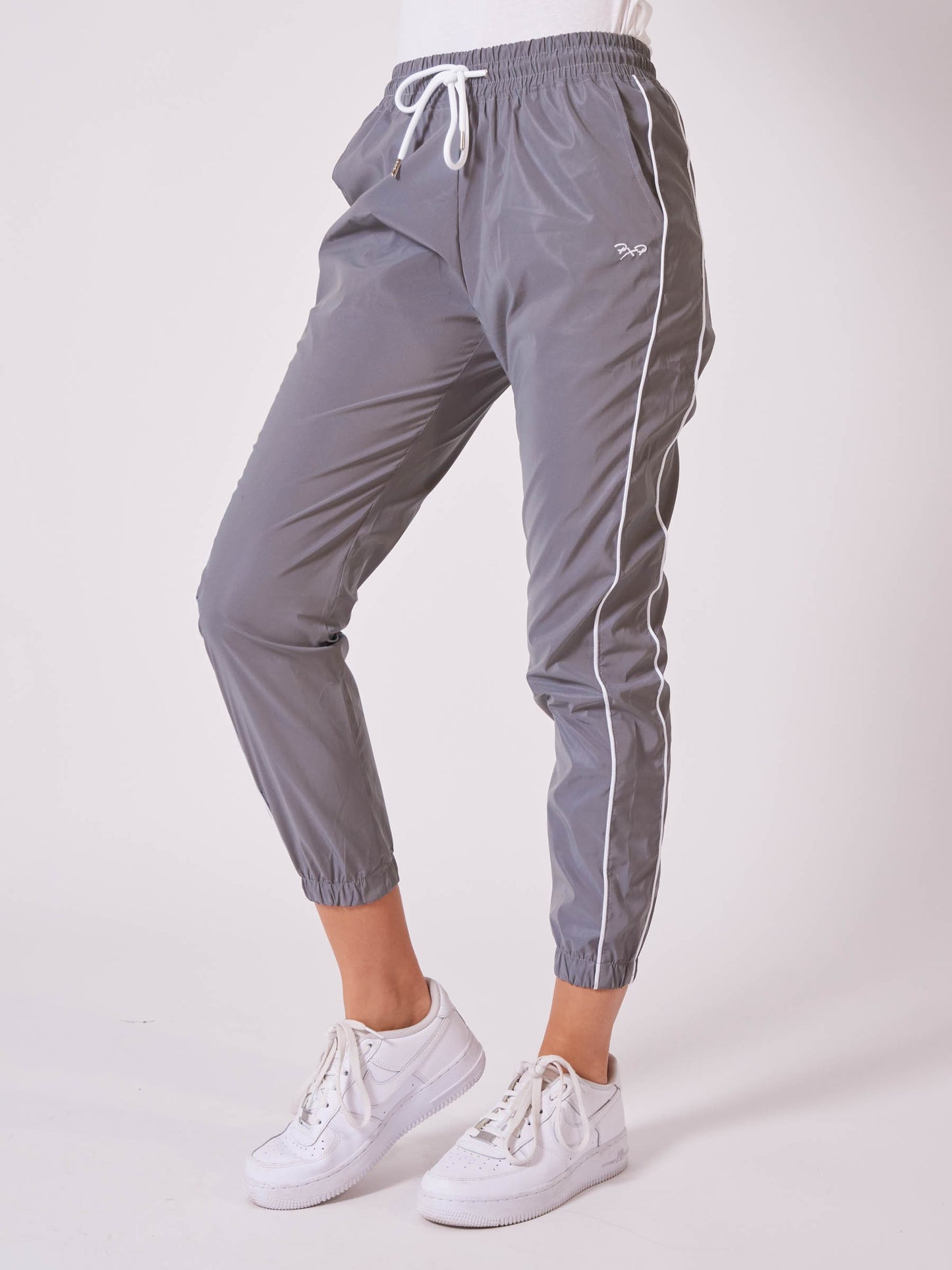 Bas de jogging bas élastiqué réfléchissante avec piping