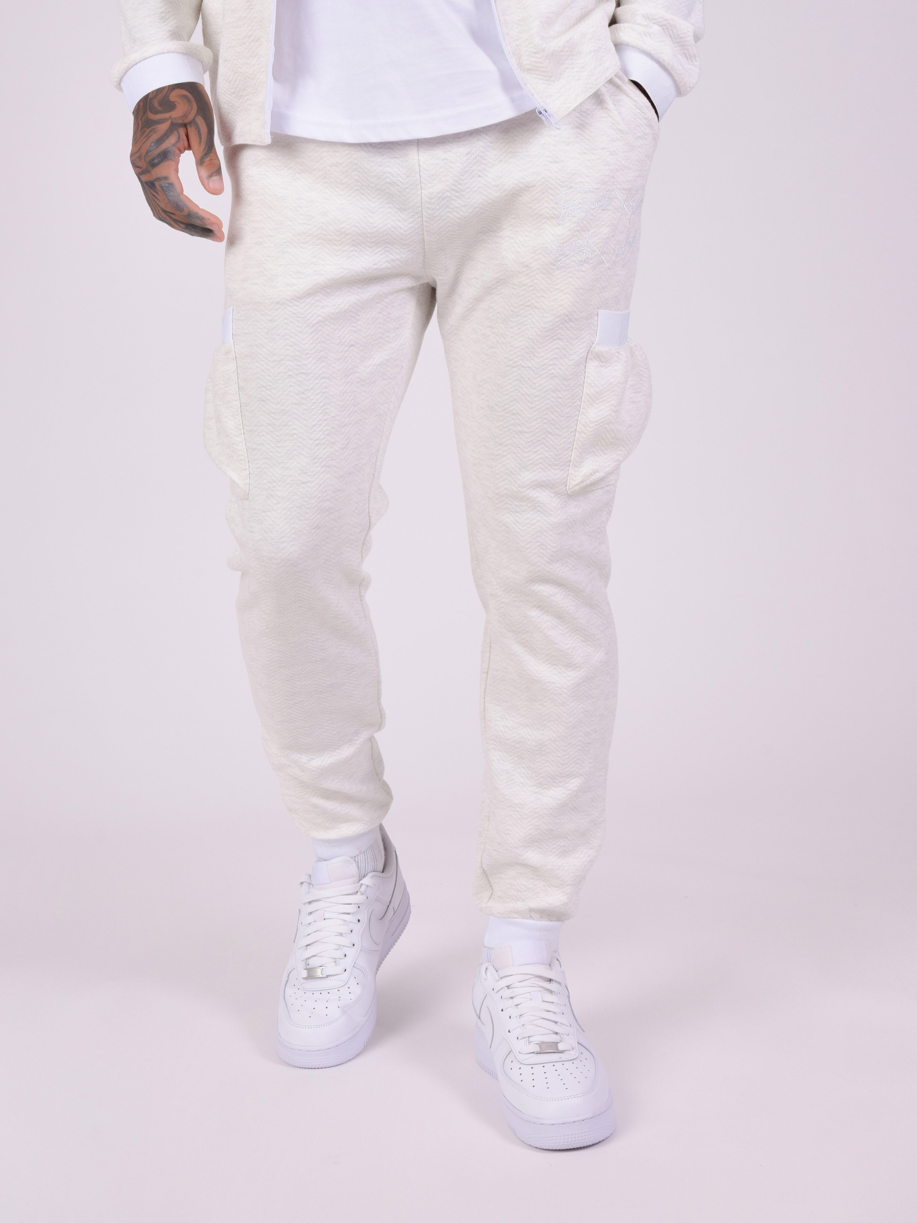 bas-de-jogging-en-tissus-texture-et-details-elastique-sport-blanc