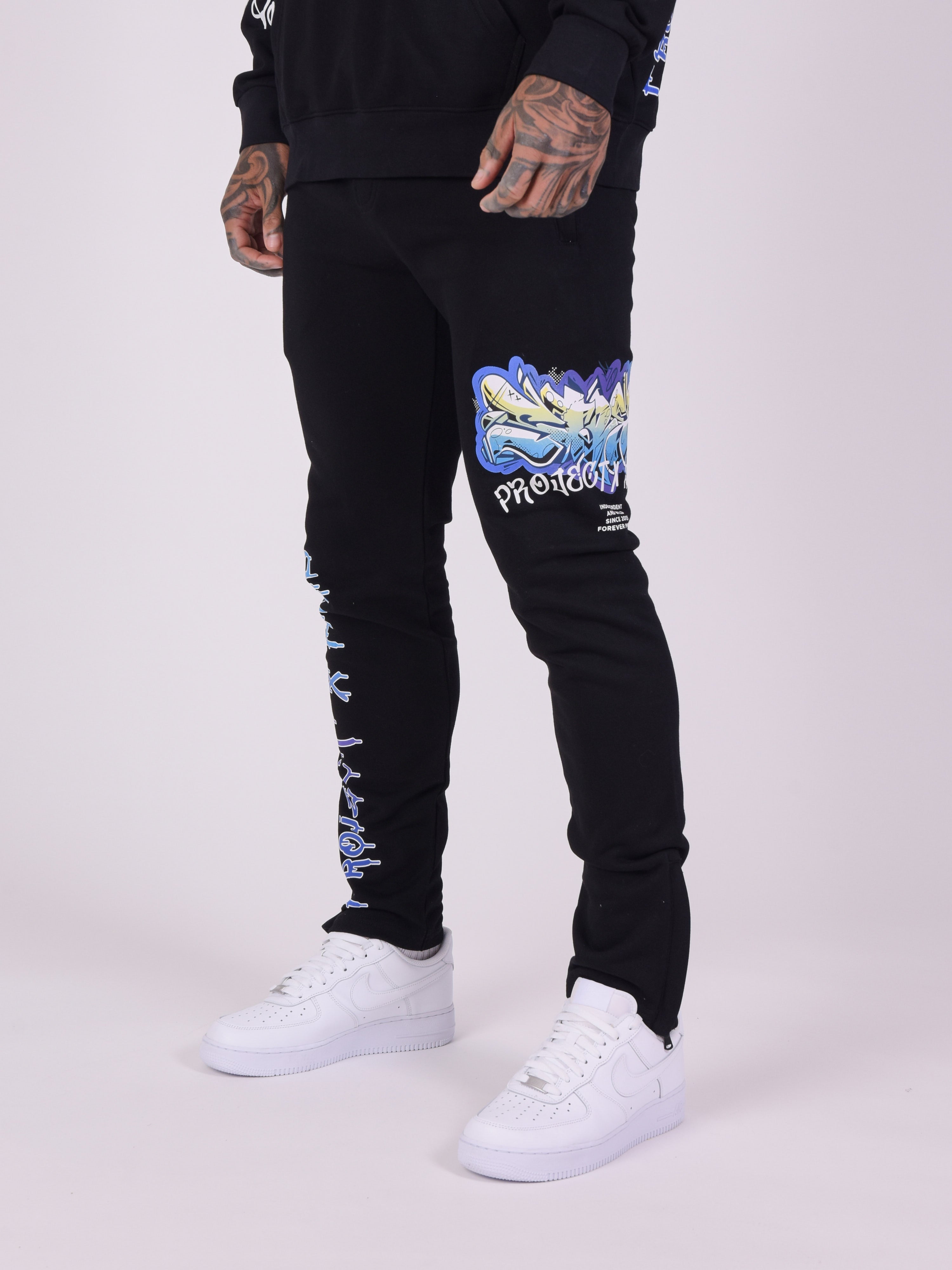 Pantaloni de trening cu imprimeu street art-1