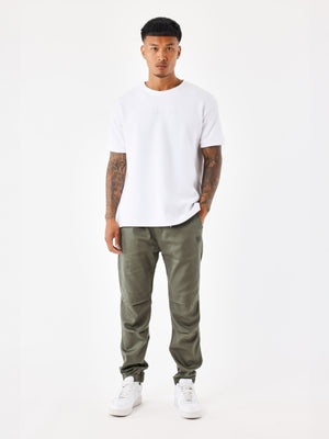 bas-de-jogging-parachute-basique-kaki-modelshot