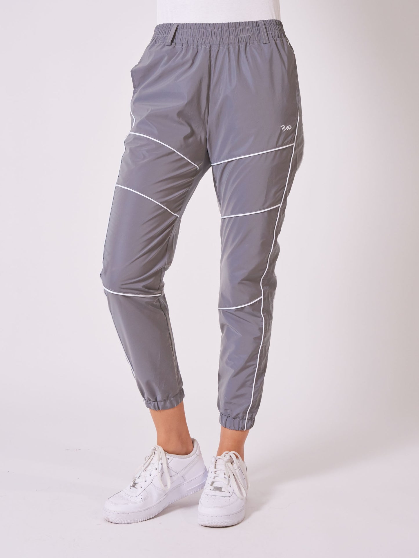 bas-de-jogging-piping-reflechissant