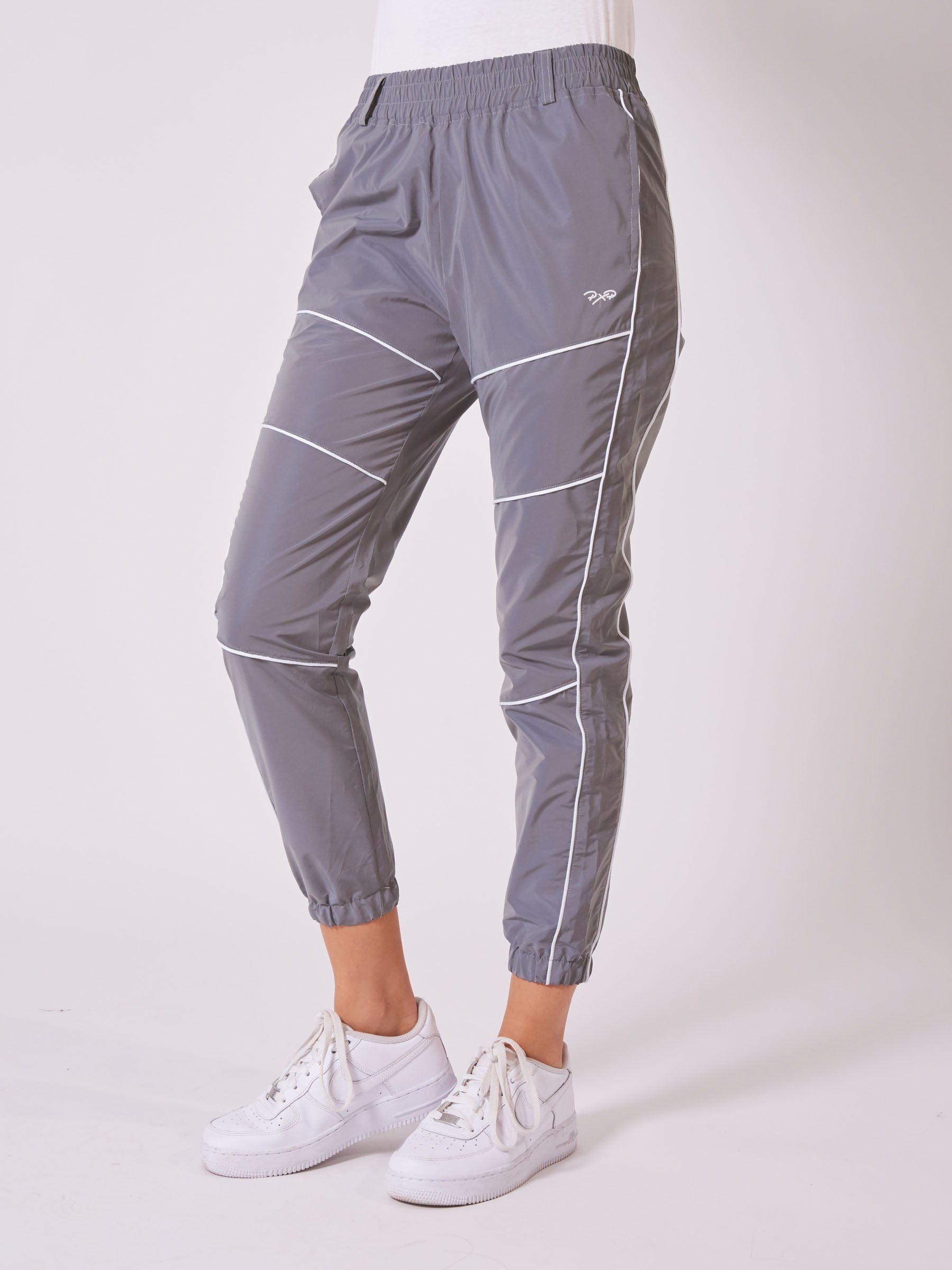 bas-de-jogging-piping-reflechissant