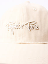 casquette-a-cordon-craie-detailshot