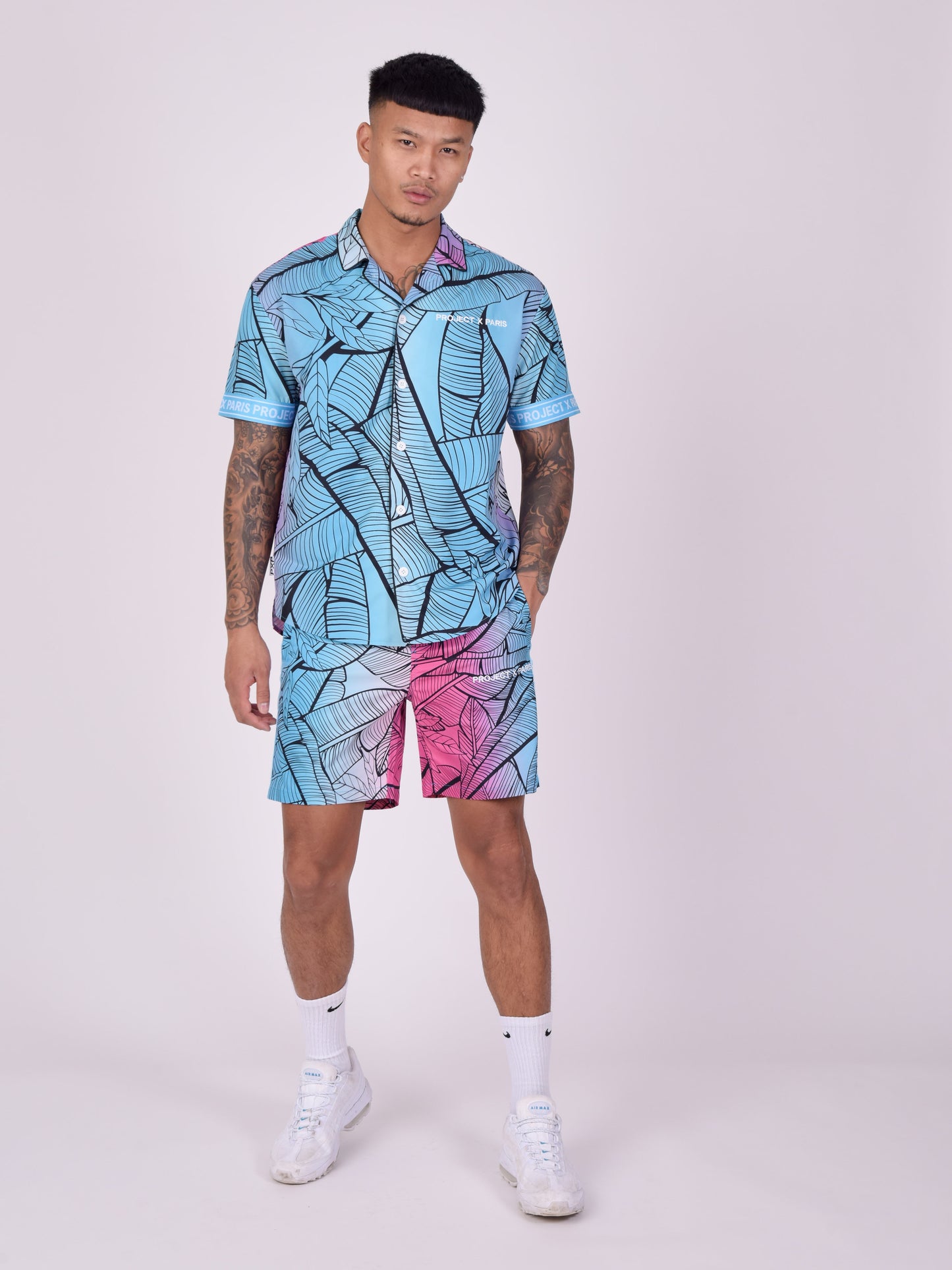 chemise-decontractee-imprime-tropical-avec-col-a-revers-bleu