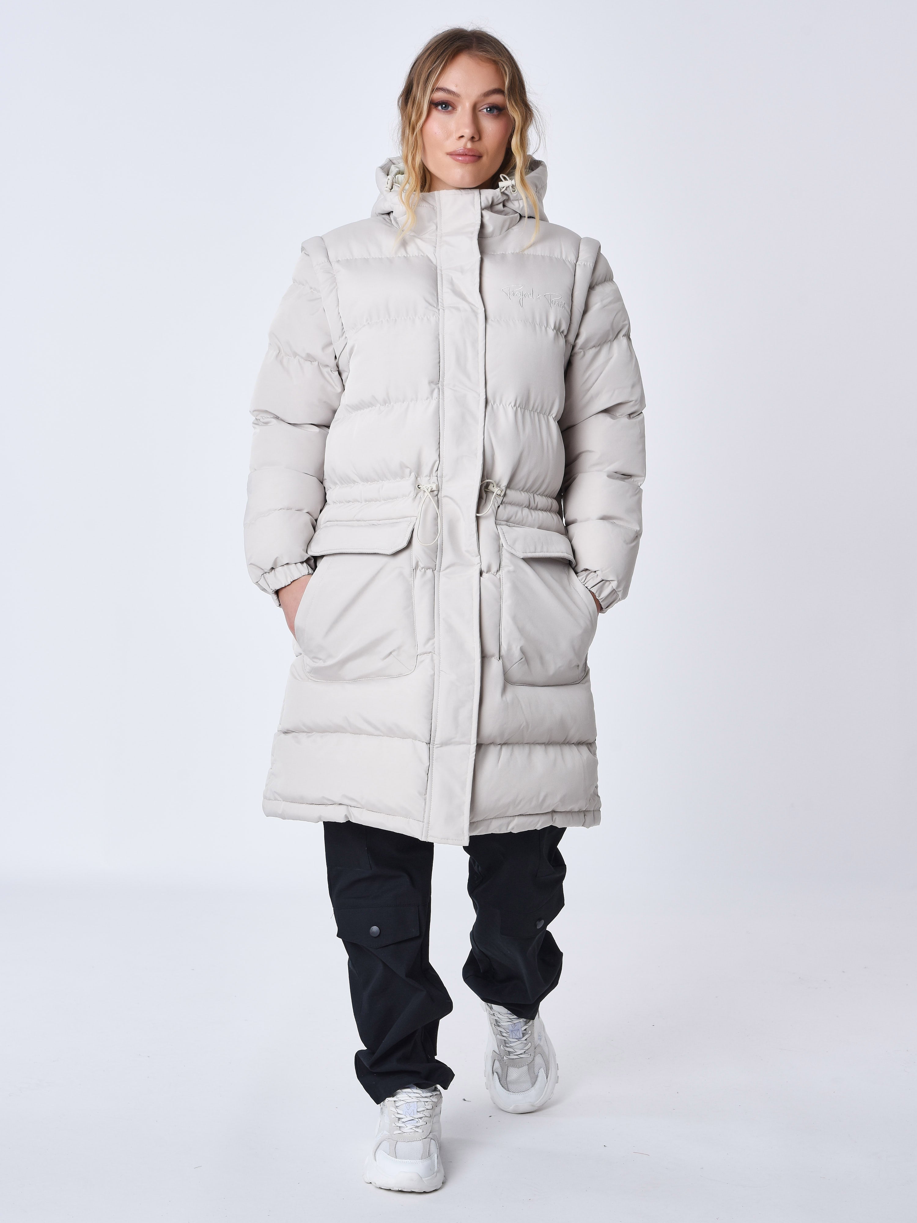 Long quilted puffer jacket with removable sleeves-4