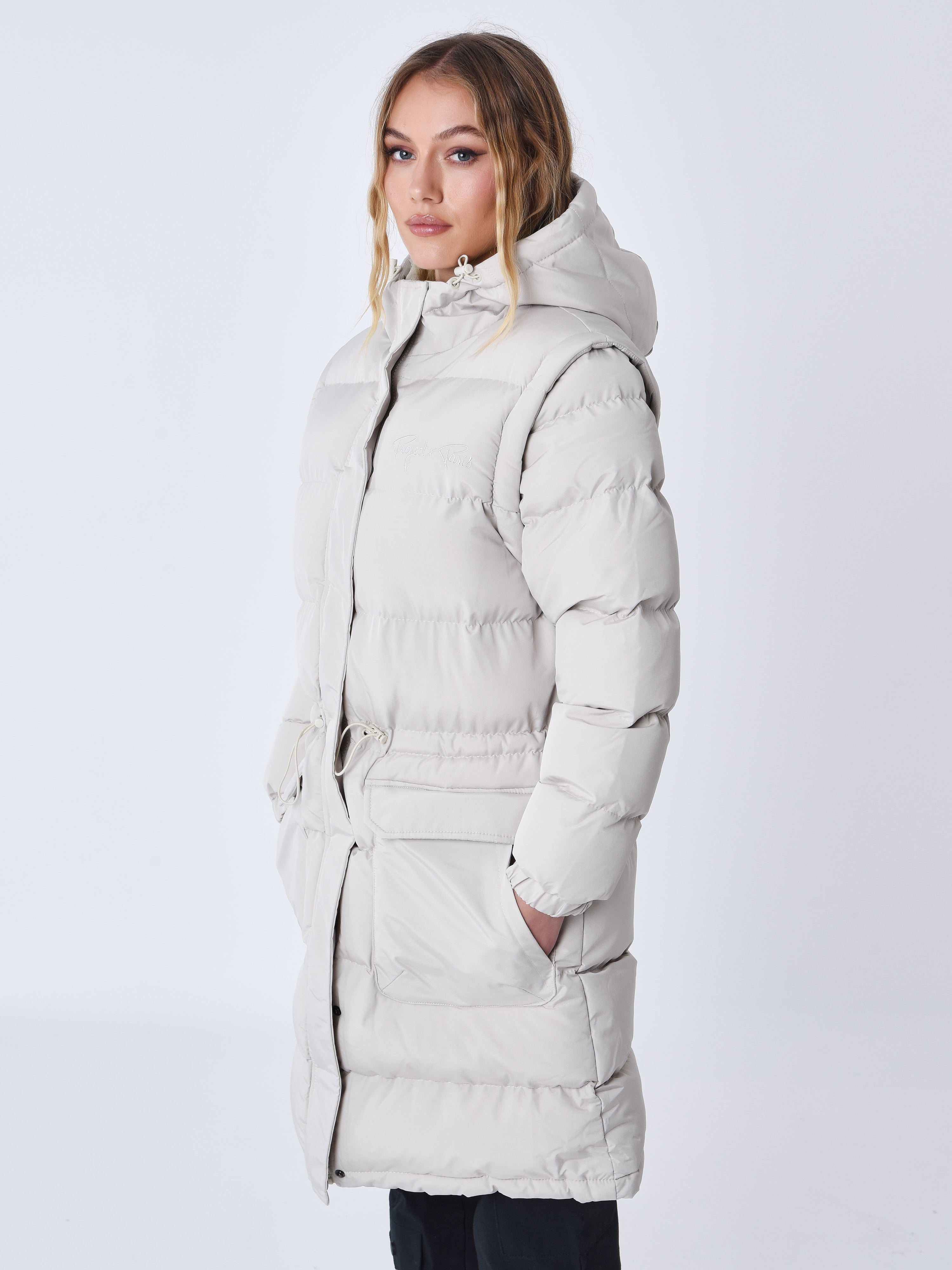 Long quilted puffer jacket with removable sleeves-5