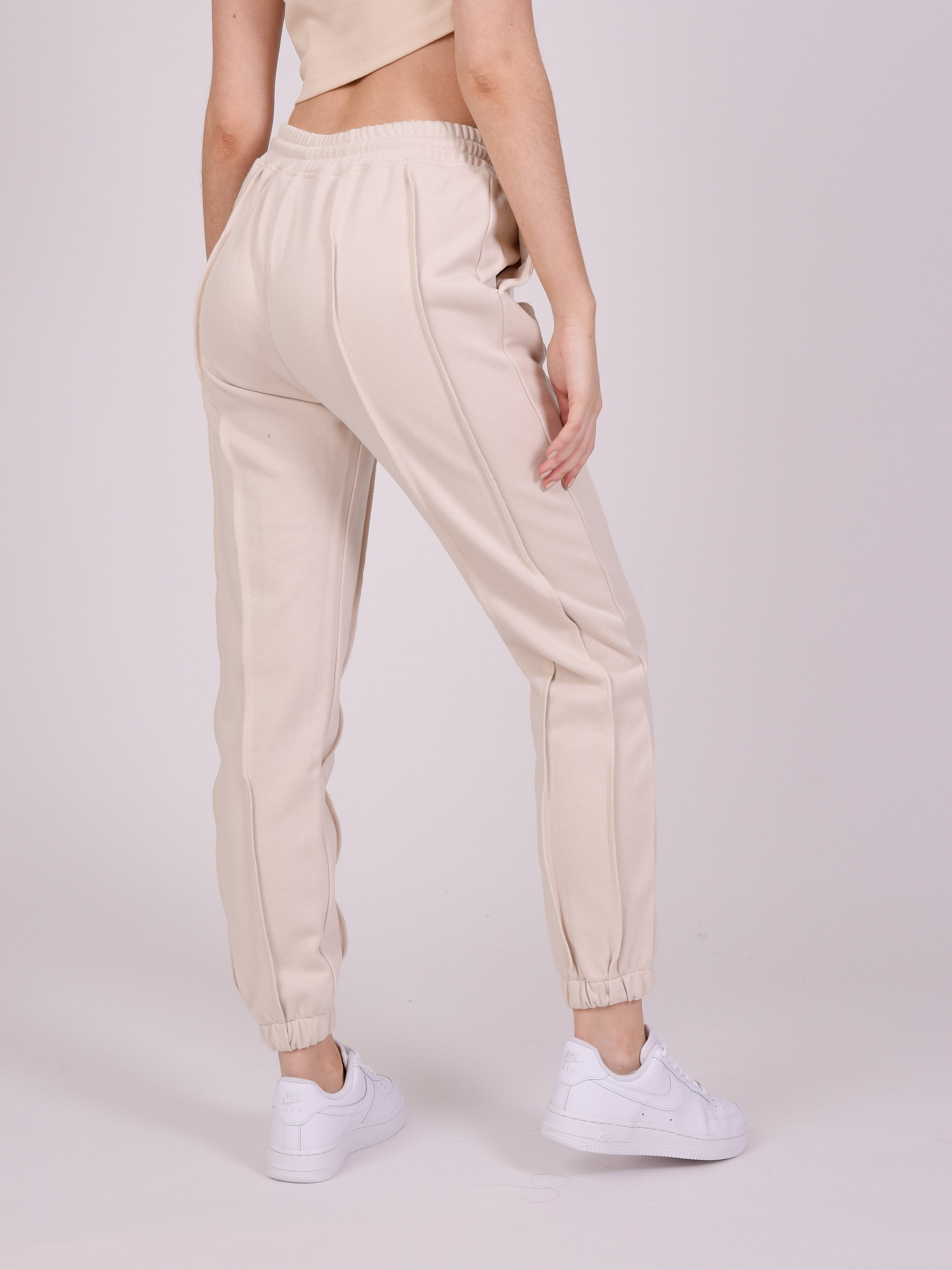Jogger bottoms with overlocked edges-5