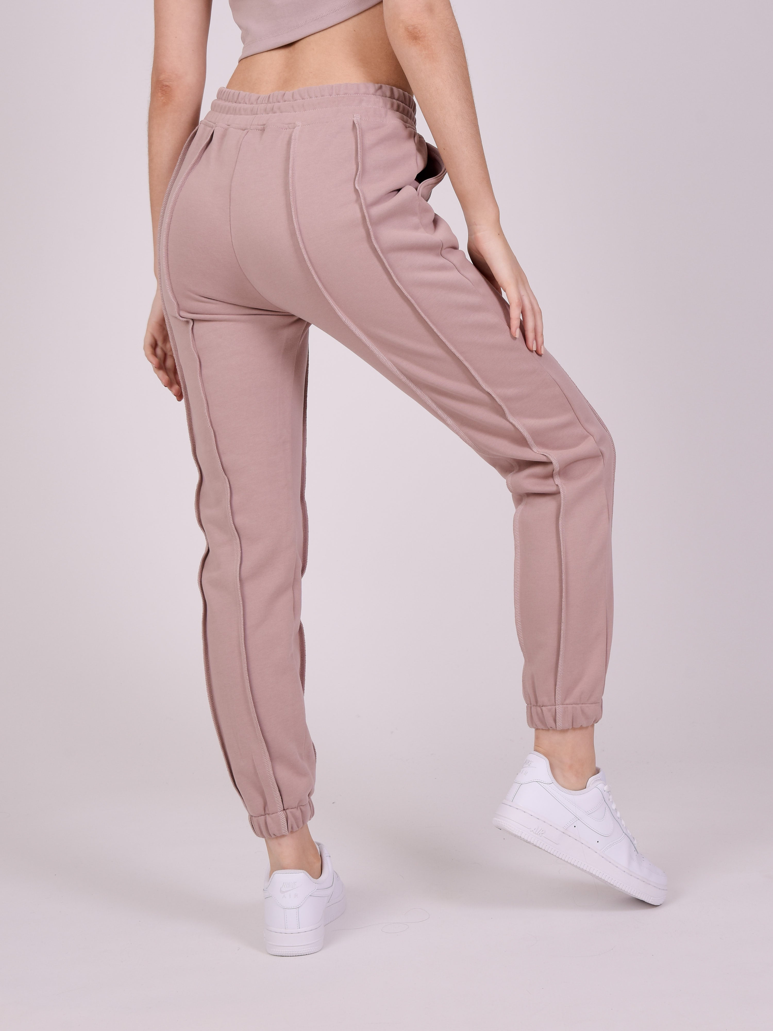 Jogger bottoms with overlocked edges-11