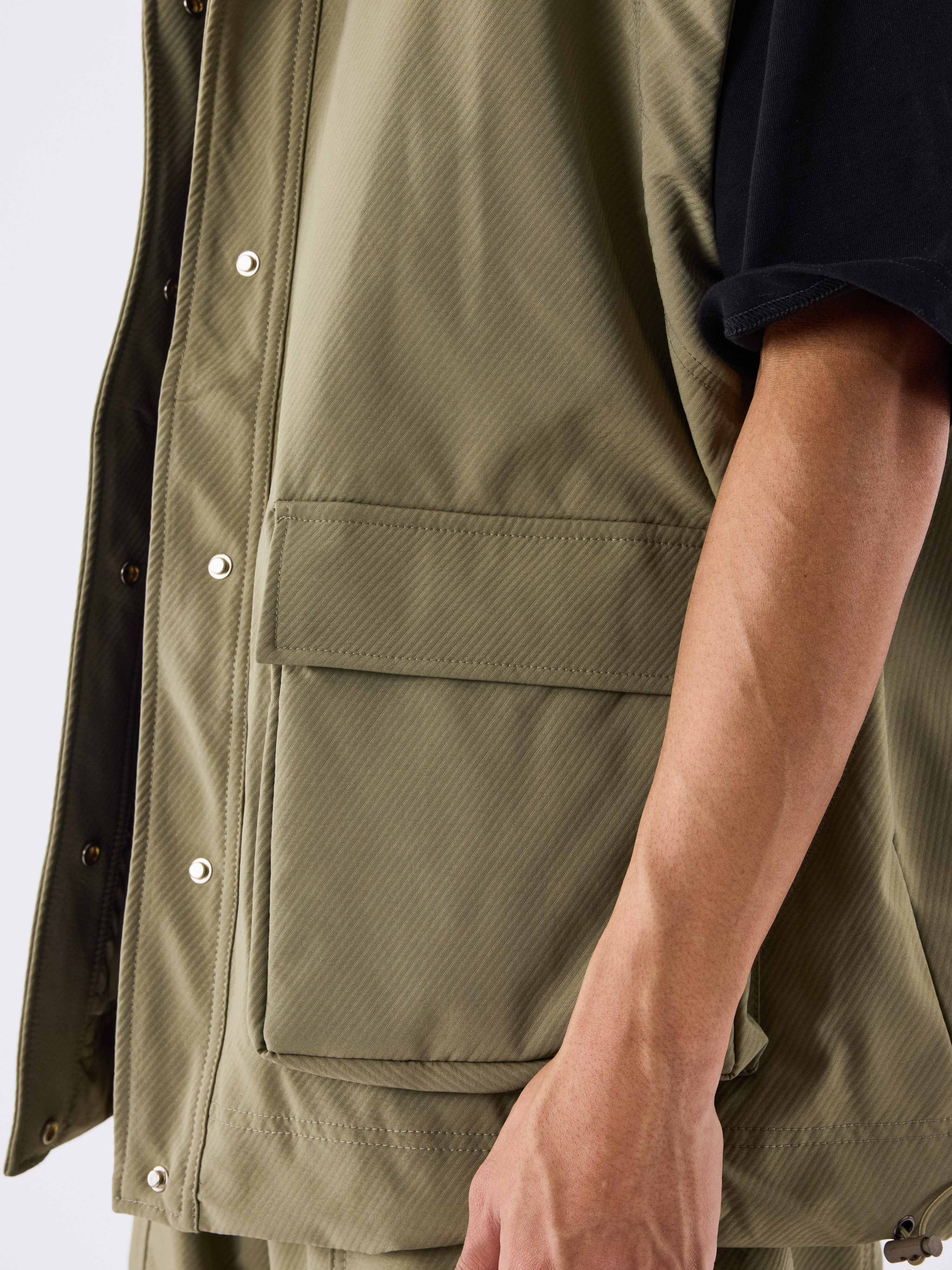 gilet-oversize-a-poches-olive