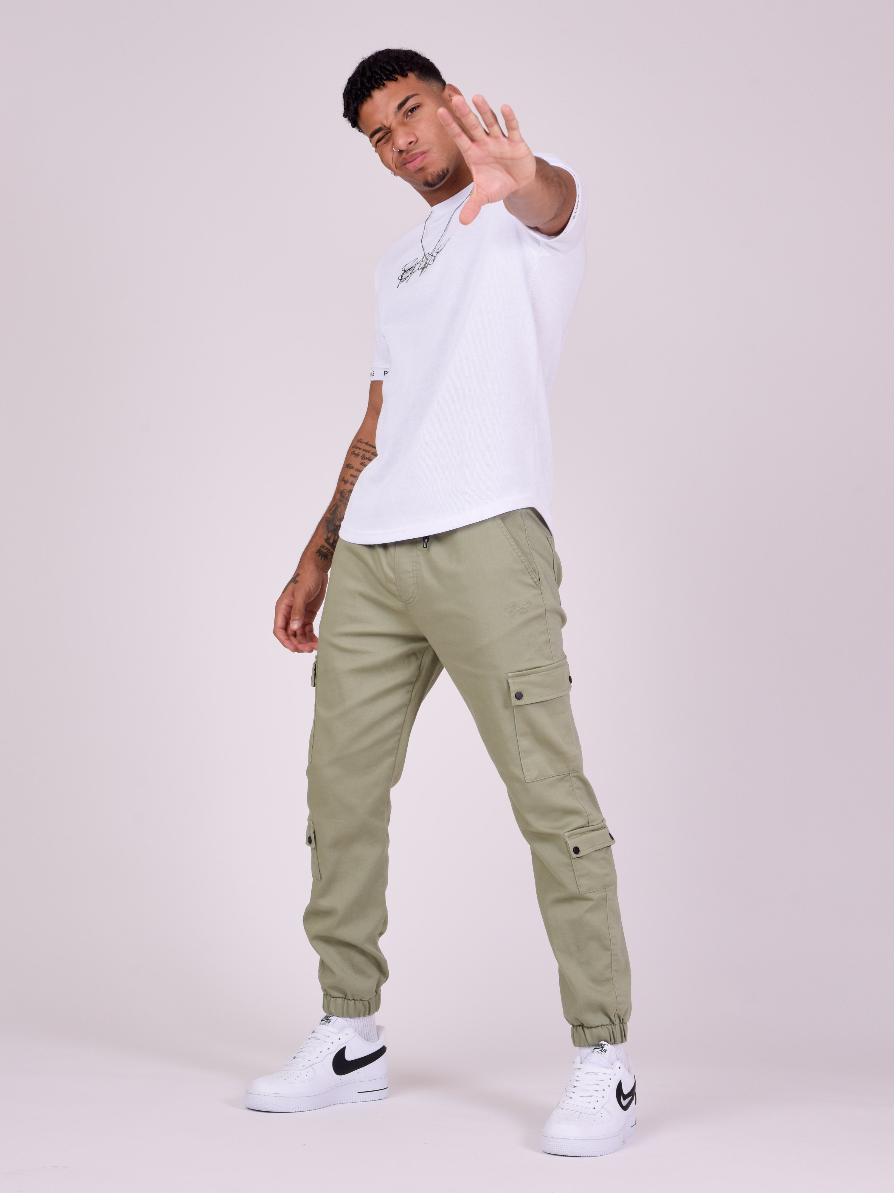 Multi-pocket cargo pants with elastic tightening-2