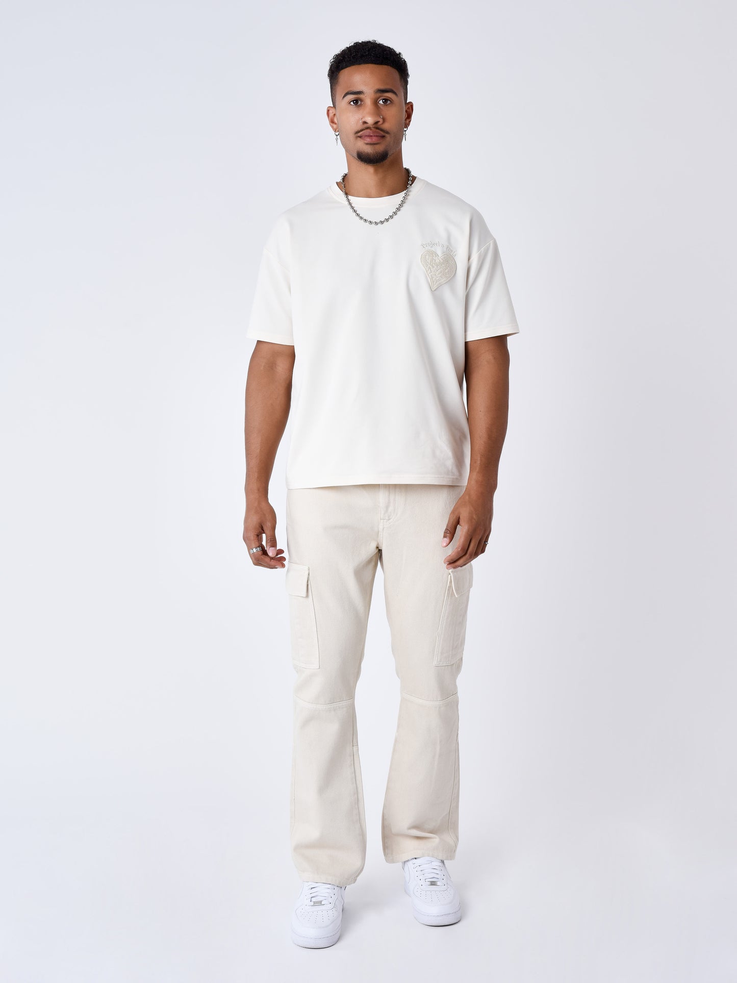 jeans-flare-a-decoupes-ivoire