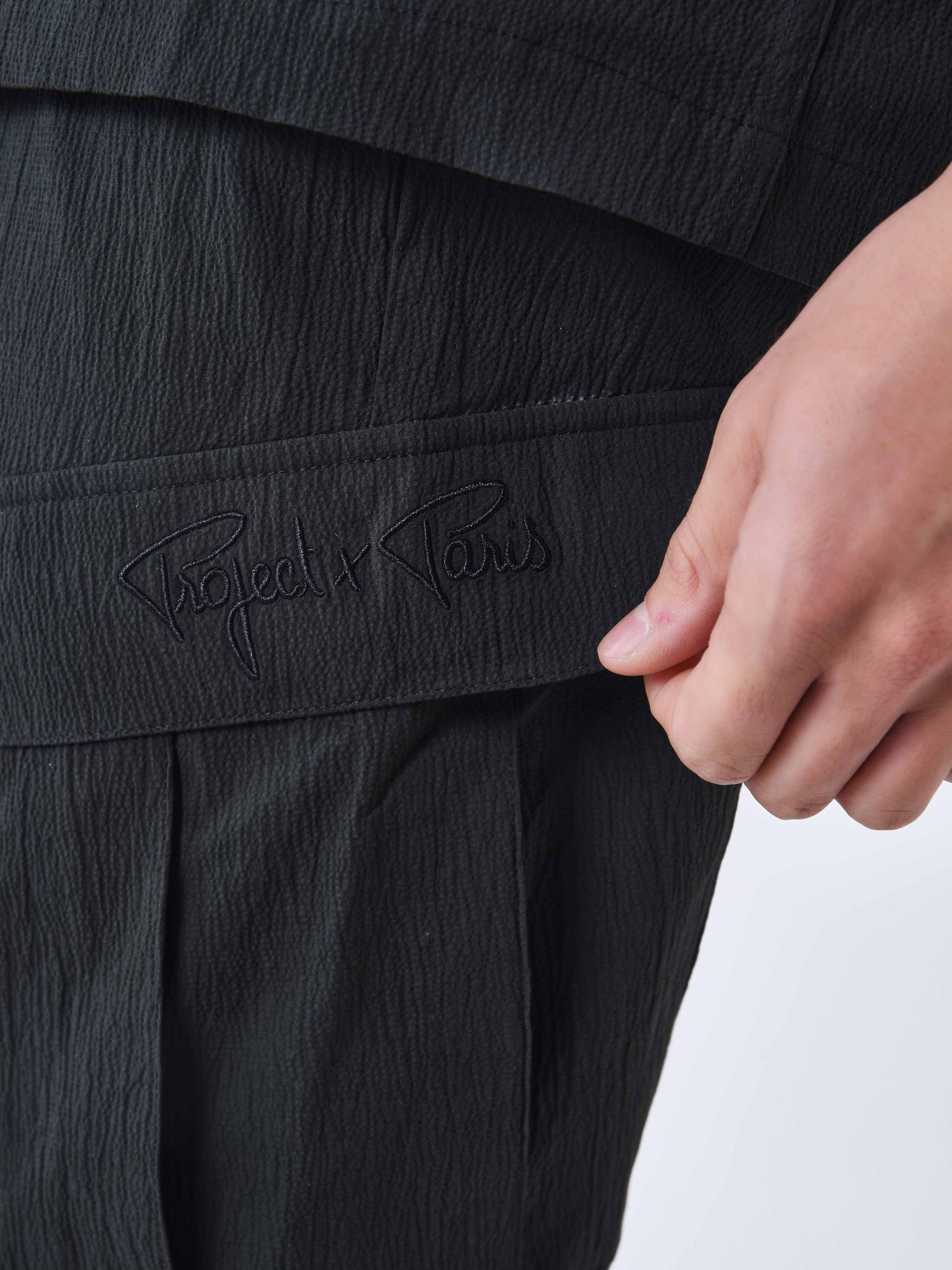 pantalon-effet-froisse-a-poches-noir