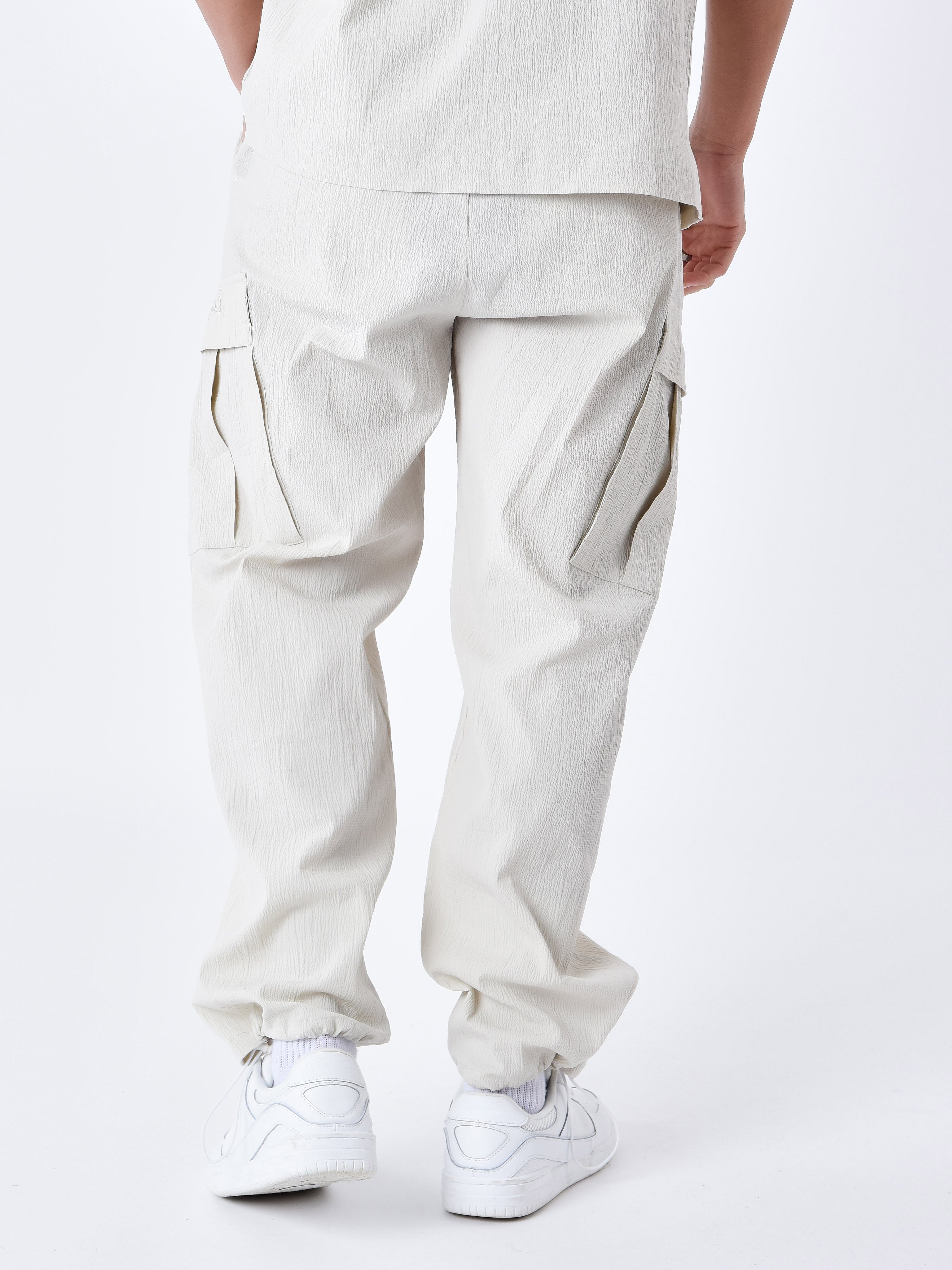 pantalon-effet-froisse-a-poches-beige