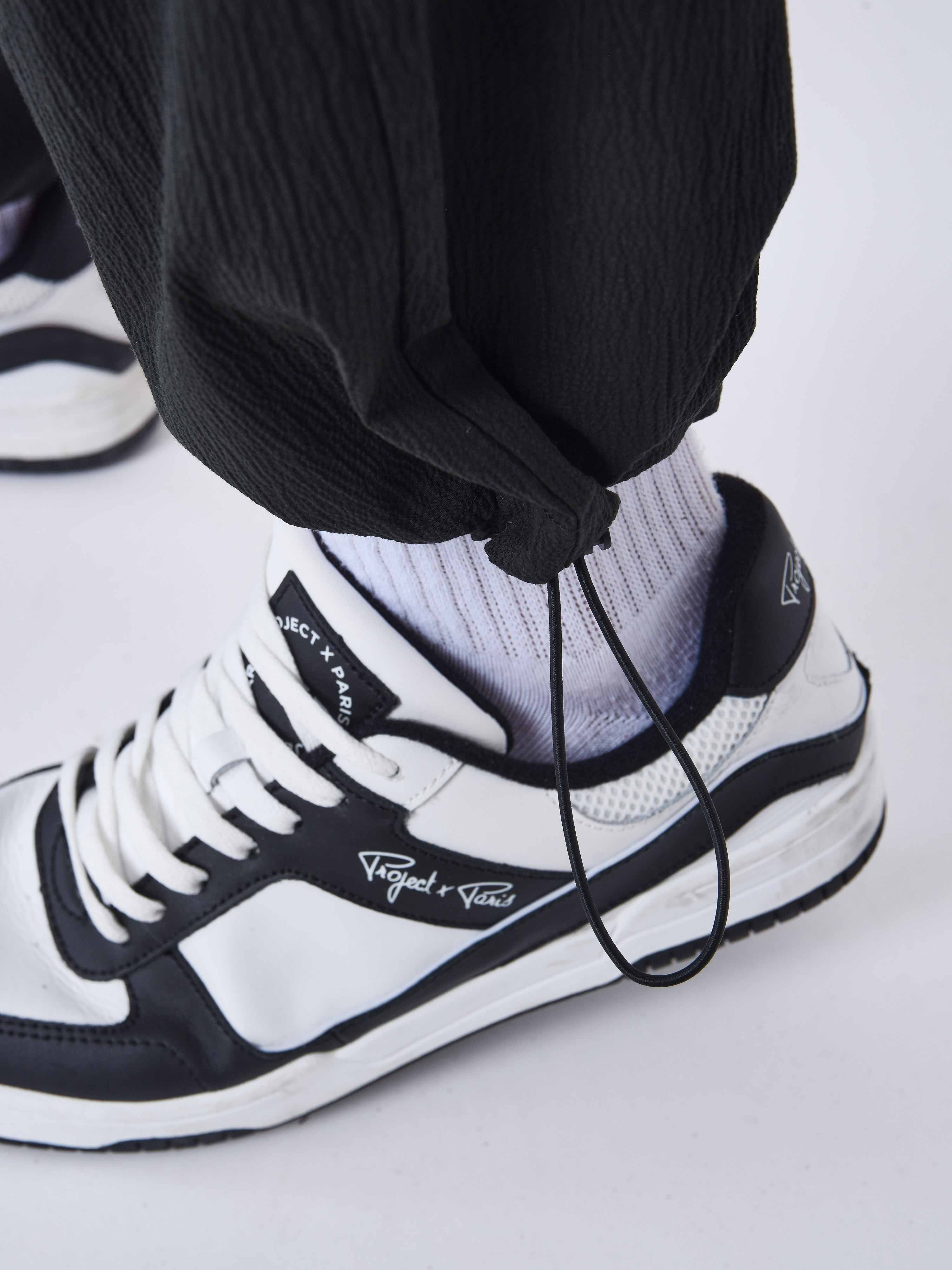 pantalon-effet-froisse-a-poches-noir