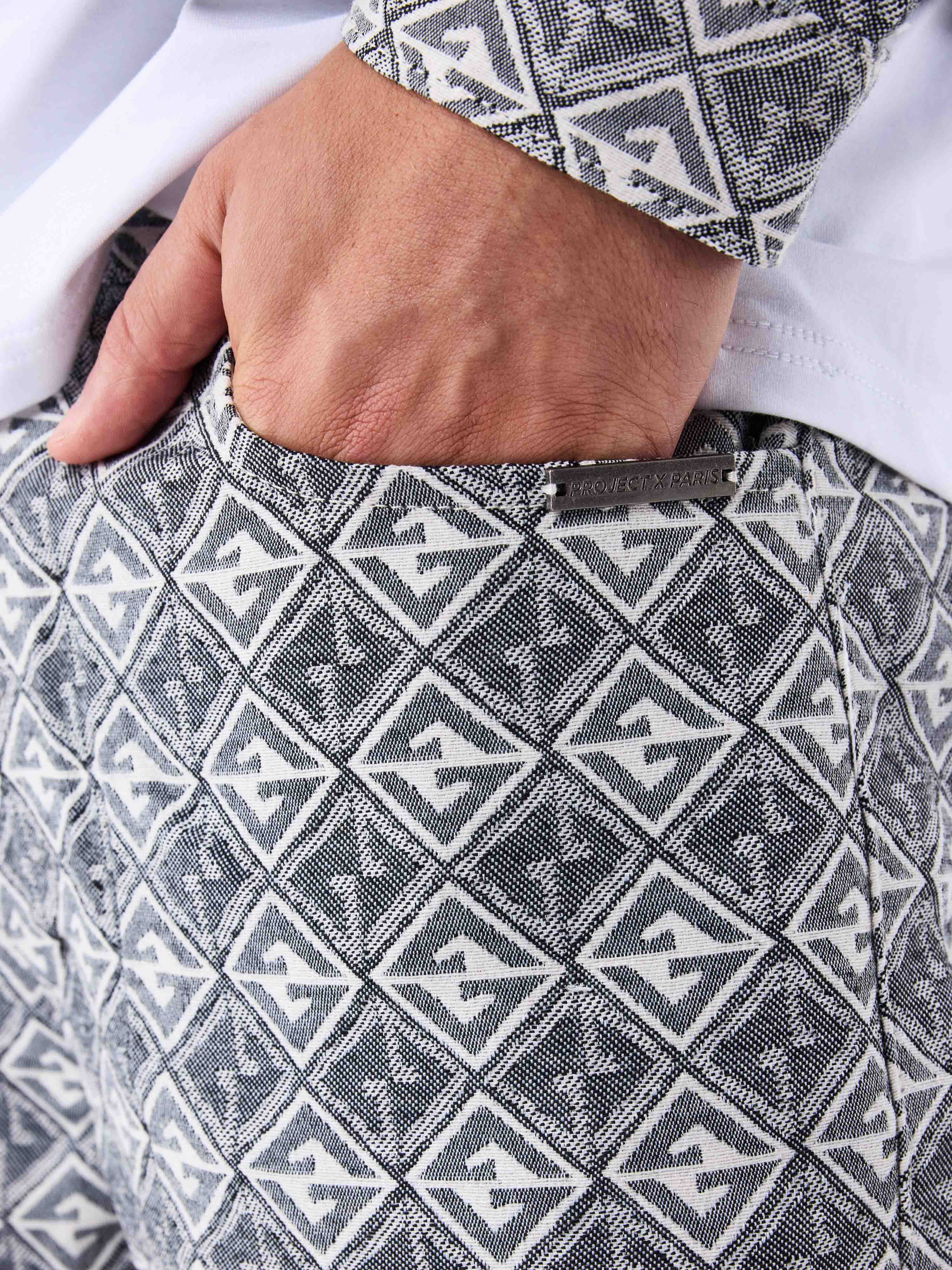 Calça de sarja com estampa geométrica-6