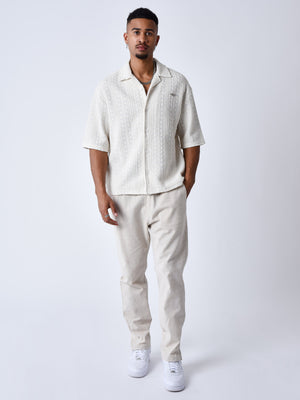 pantalon-en-toile-ivoire-modelshot