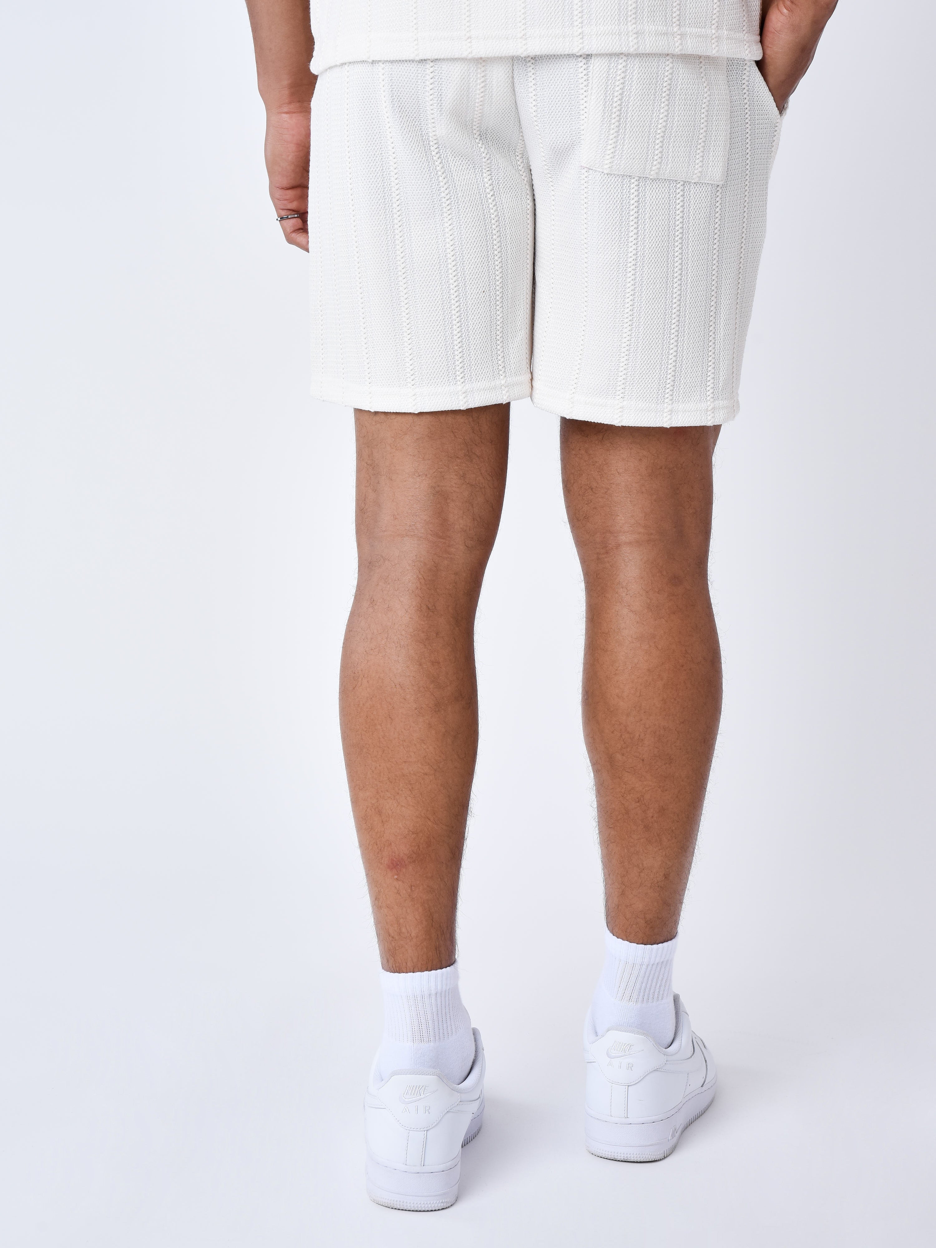 short-decontractee-en-maille-blanc-casse