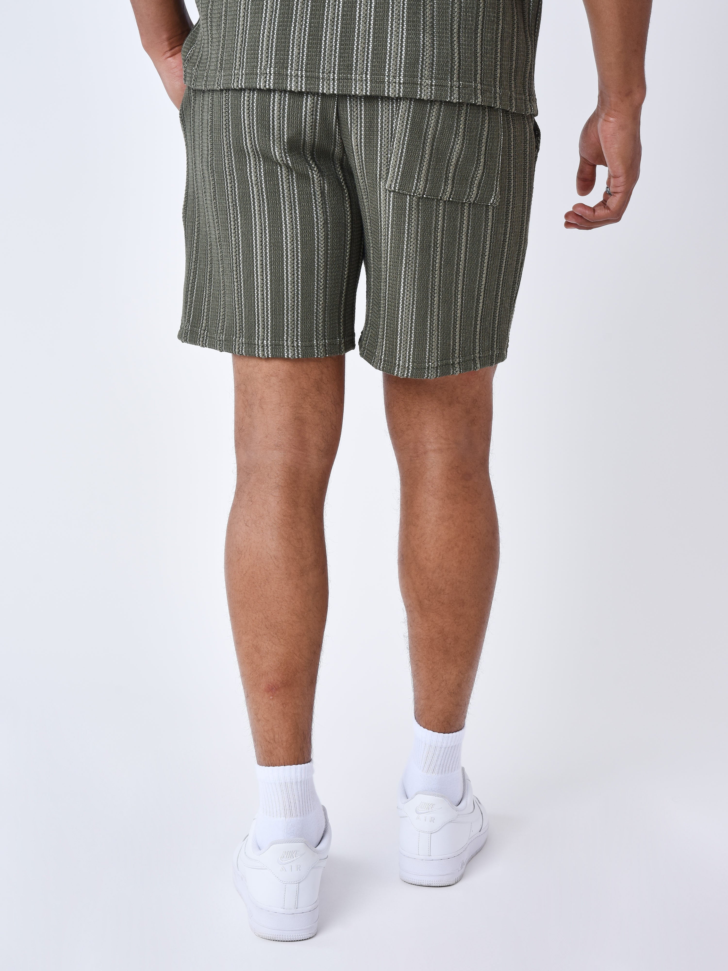 short-decontractee-en-maille-olive-fonce