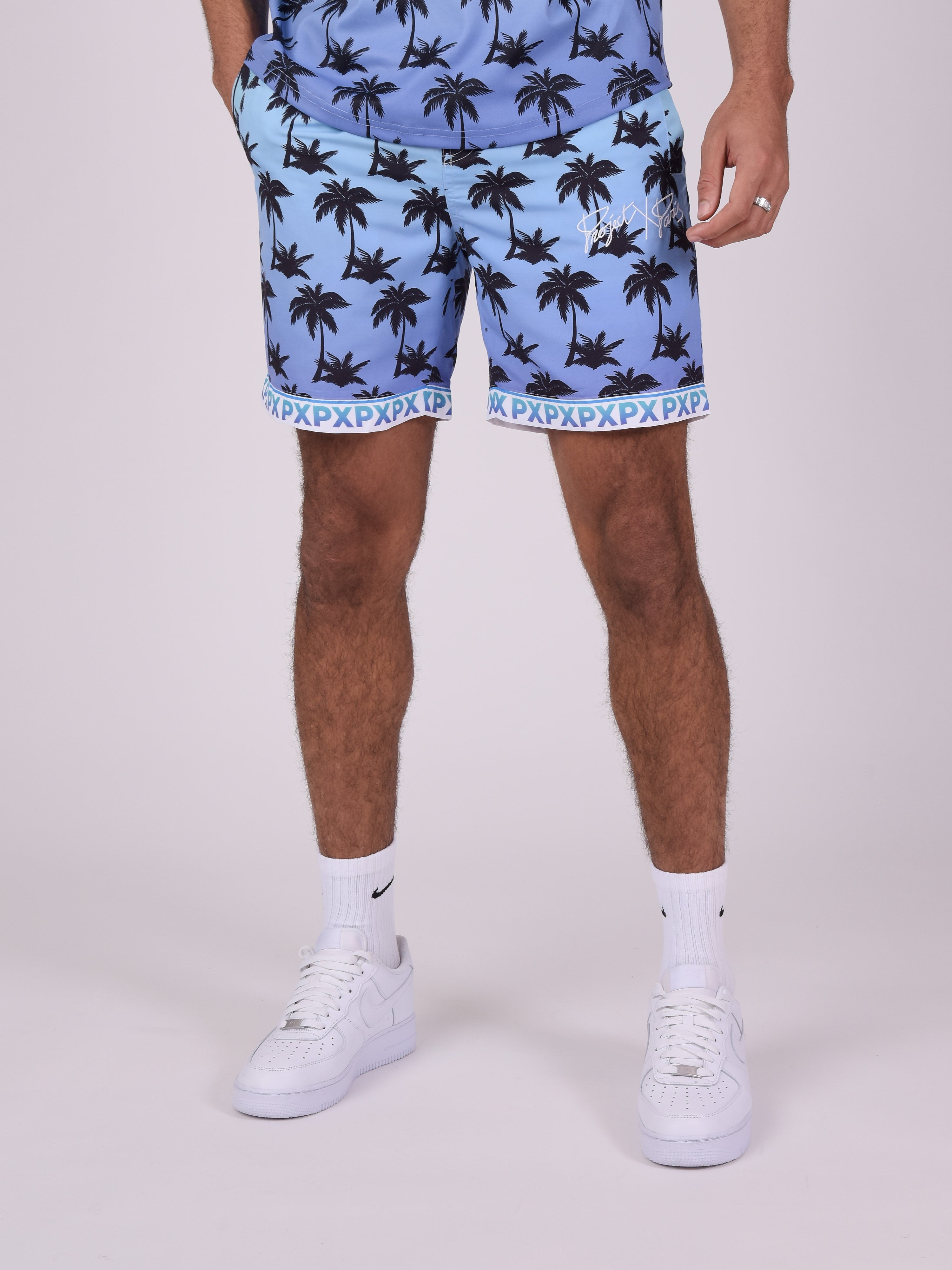 short-imprime-palmier-degrade-bleu