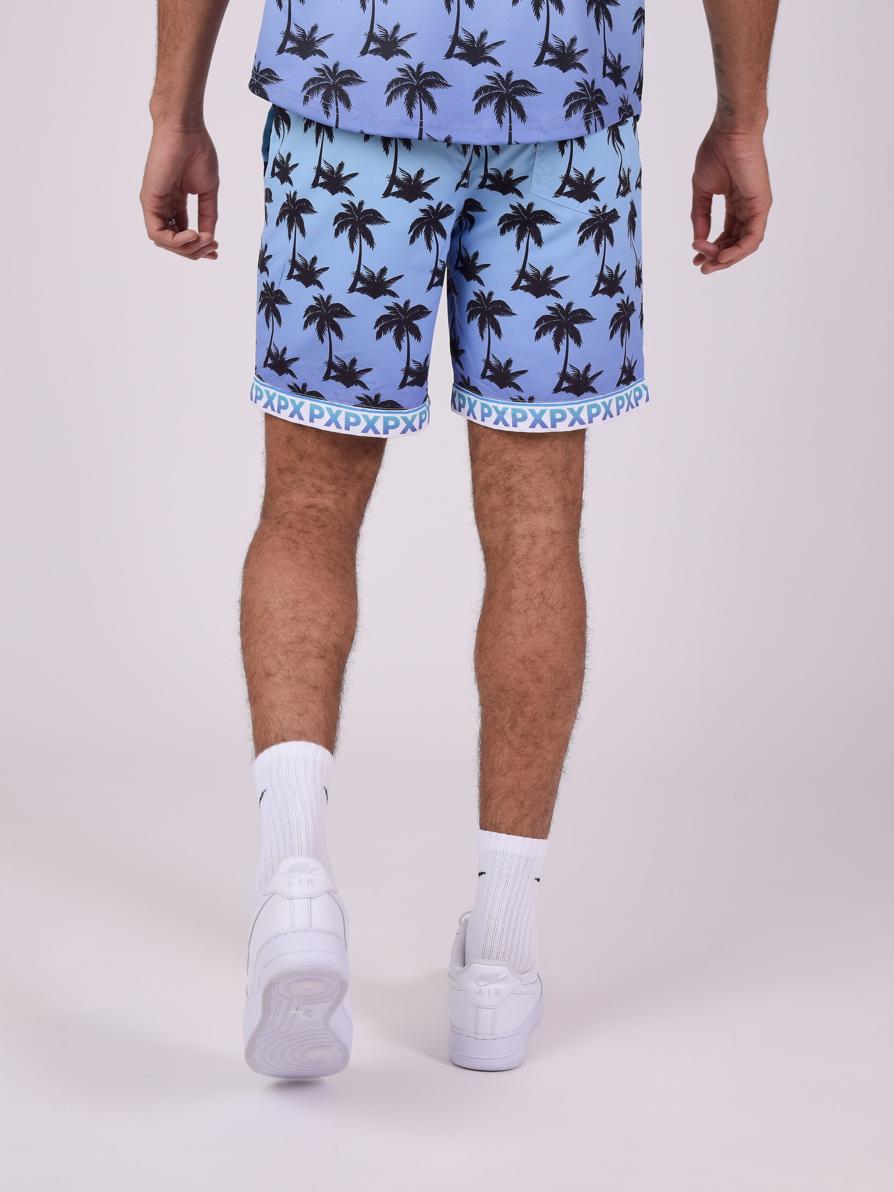 Shorts mit Farbverlauf und Palmenprint-5
