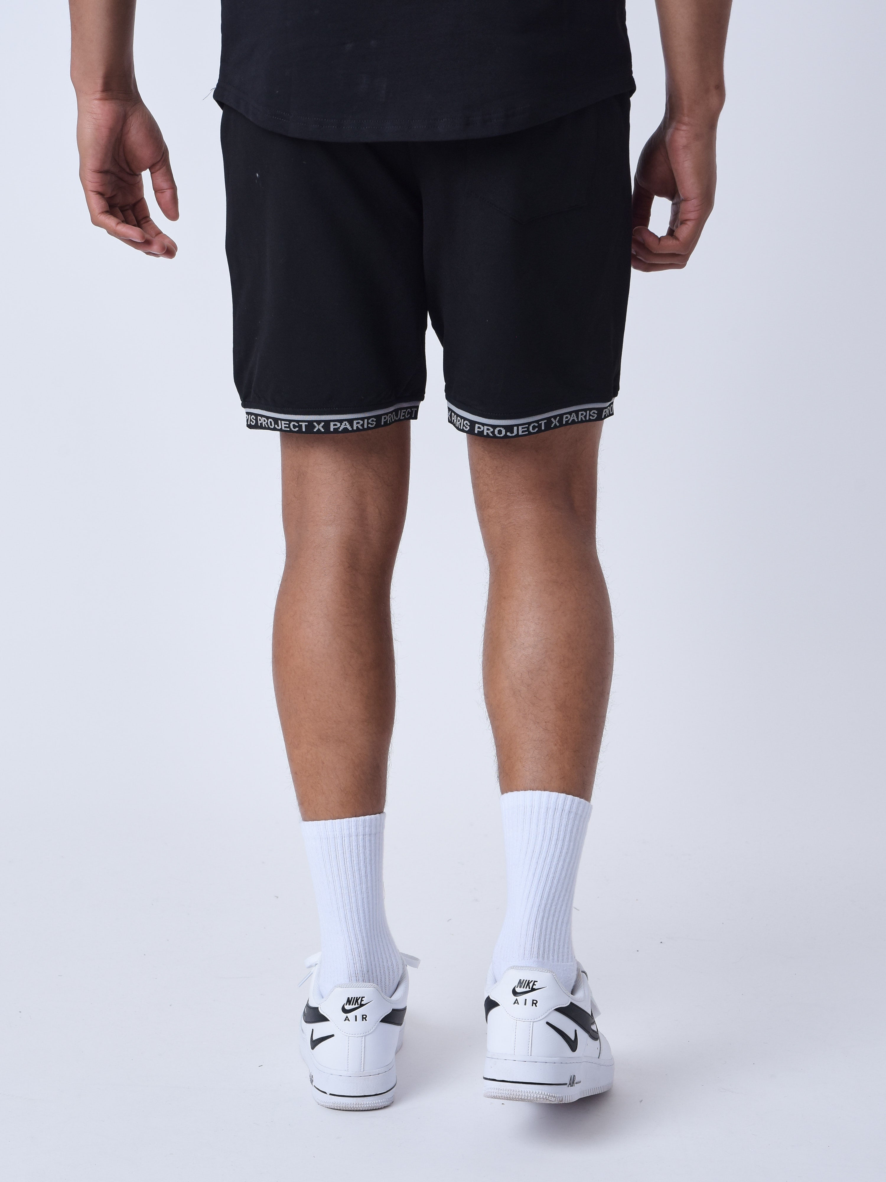 short-logo-brode-en-relief-noir