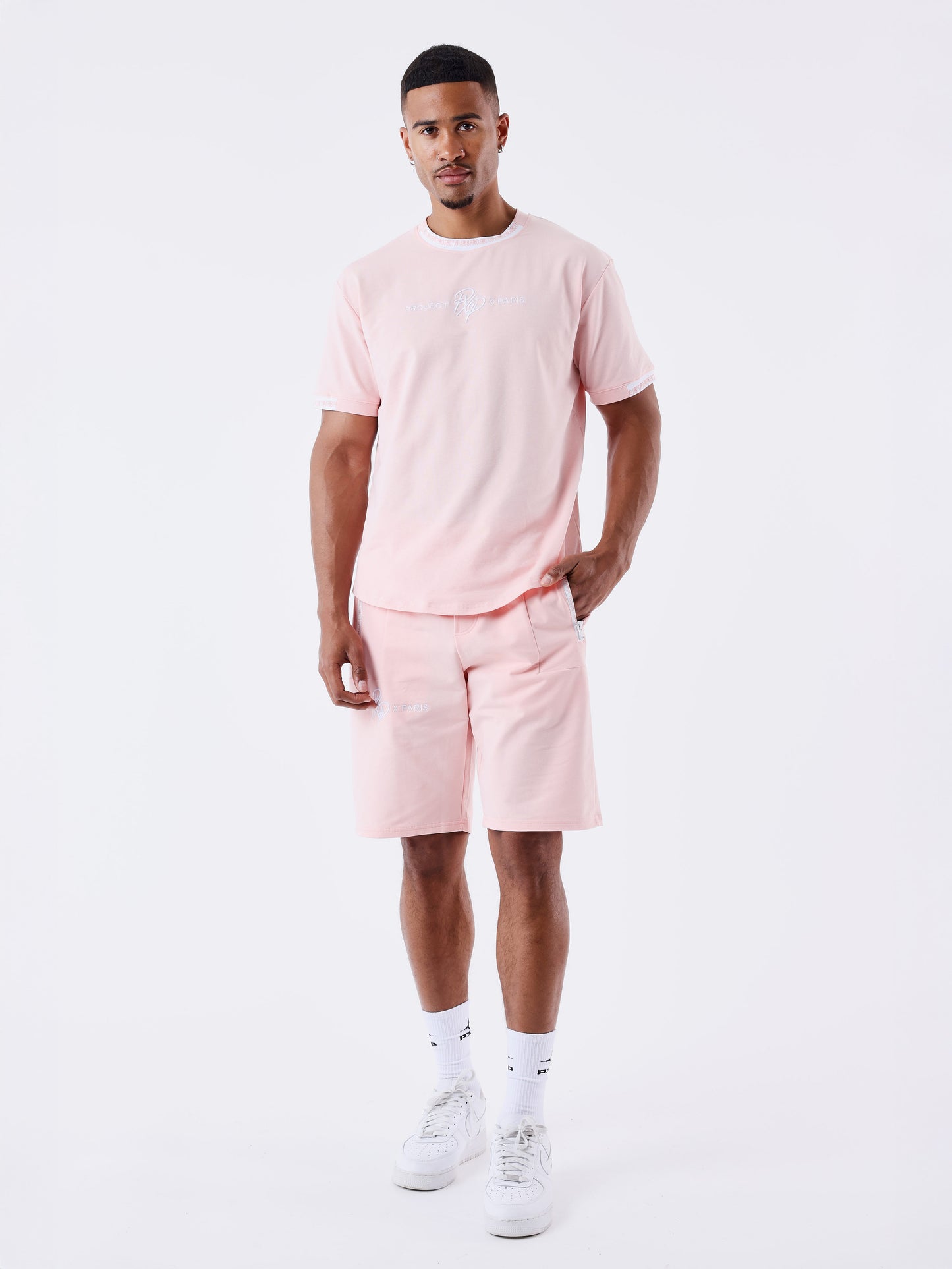 short-uni-avec-bande-logo-rose