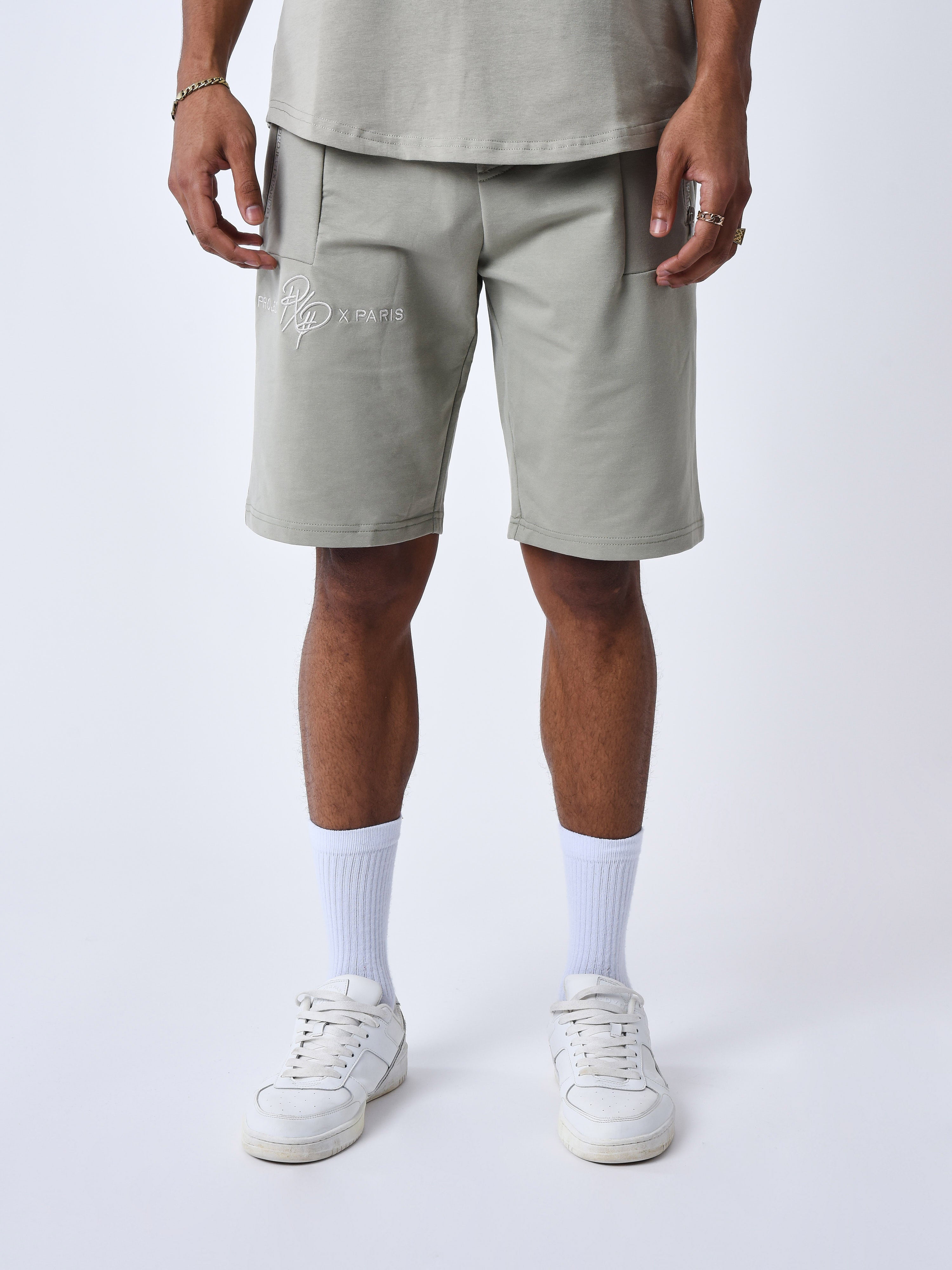 short-uni-avec-bande-logo-kaki-gris
