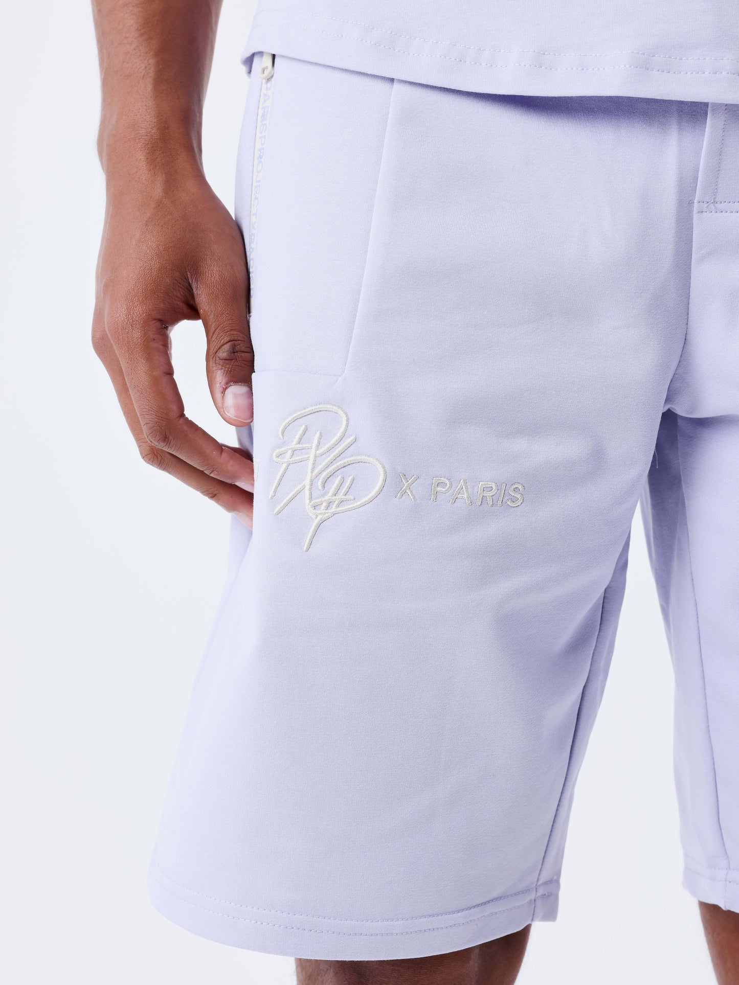 short-uni-avec-bande-logo-purple-heather