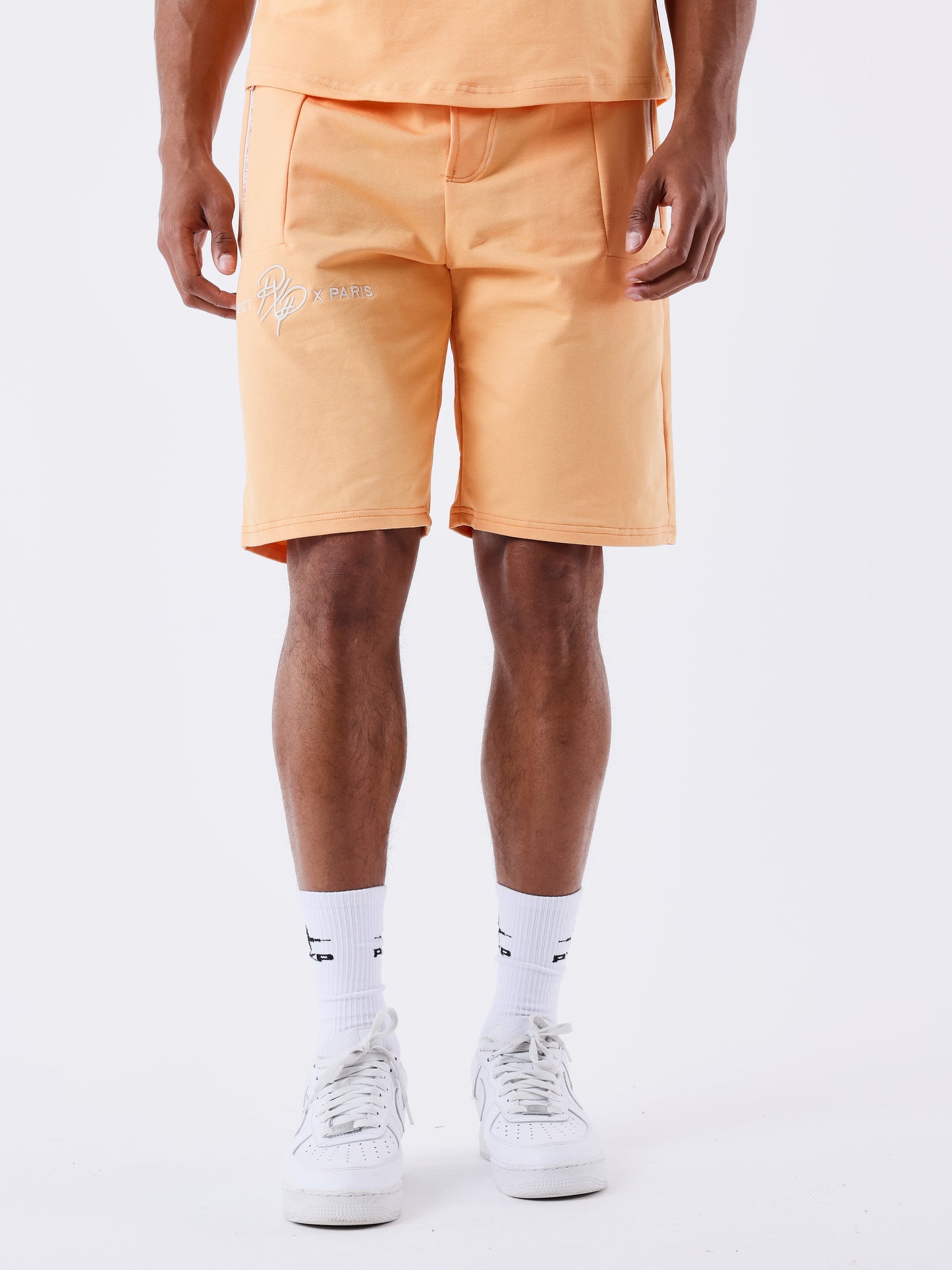 short-uni-avec-bande-logo-apricot-cream