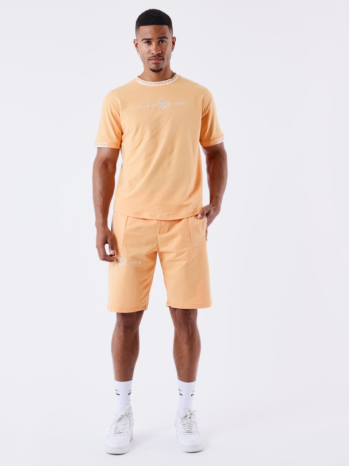 short-uni-avec-bande-logo-apricot-cream