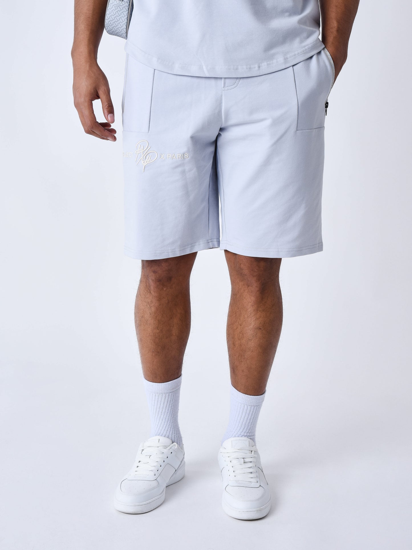 short-uni-avec-bande-logo-bleu-glacier