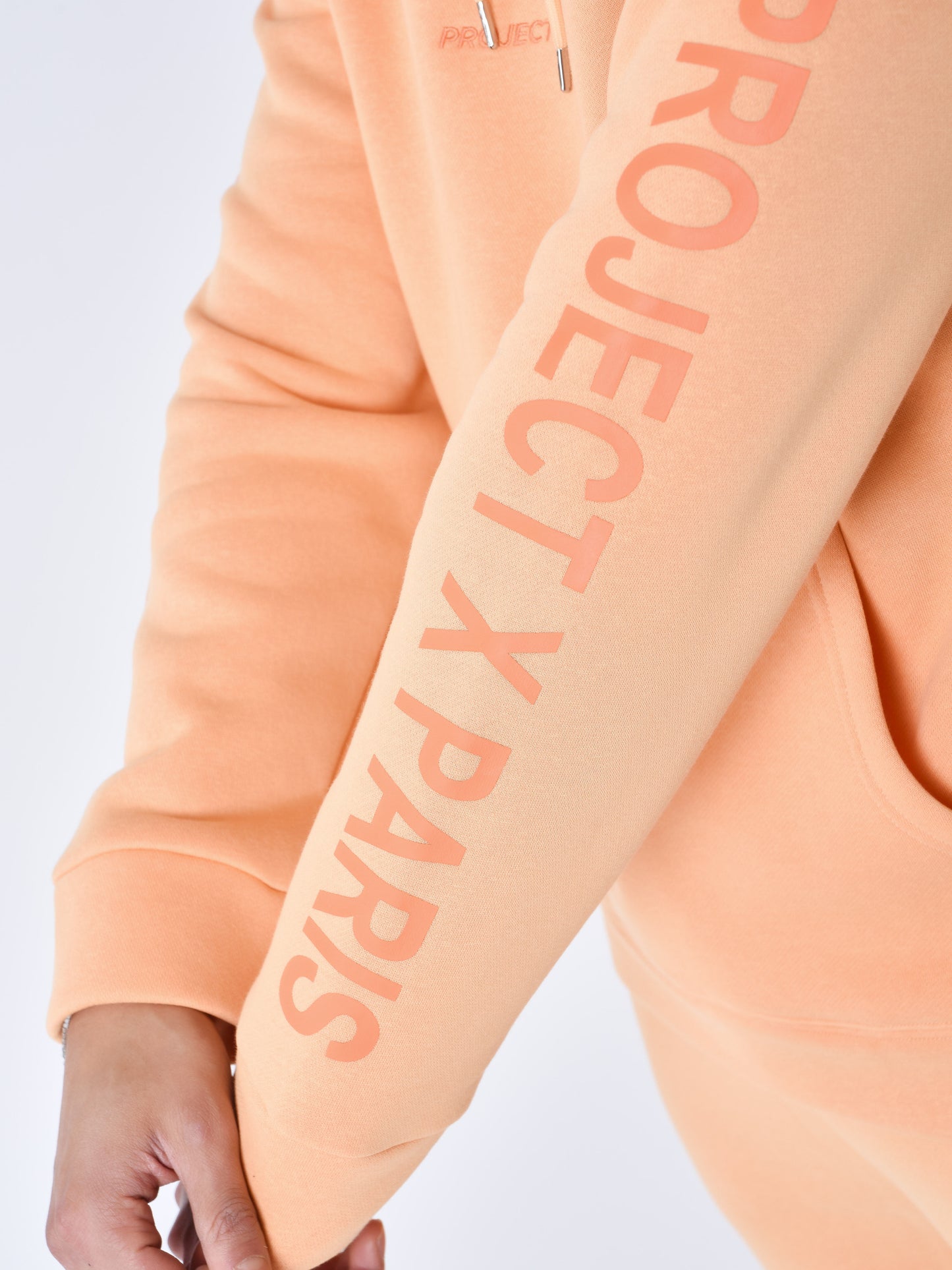 sweat-a-capuche-logote-apricot-cream