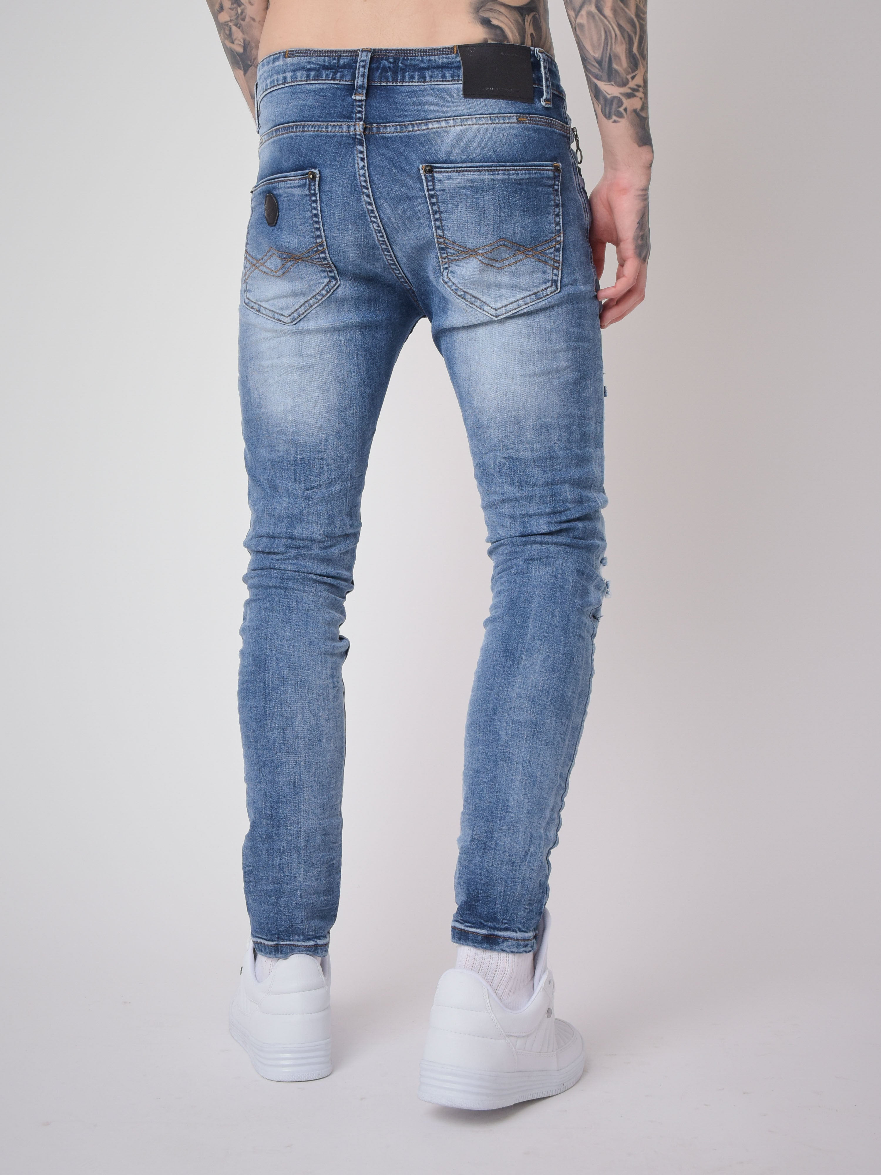 Skinny jeans with worn and scratched effect-4