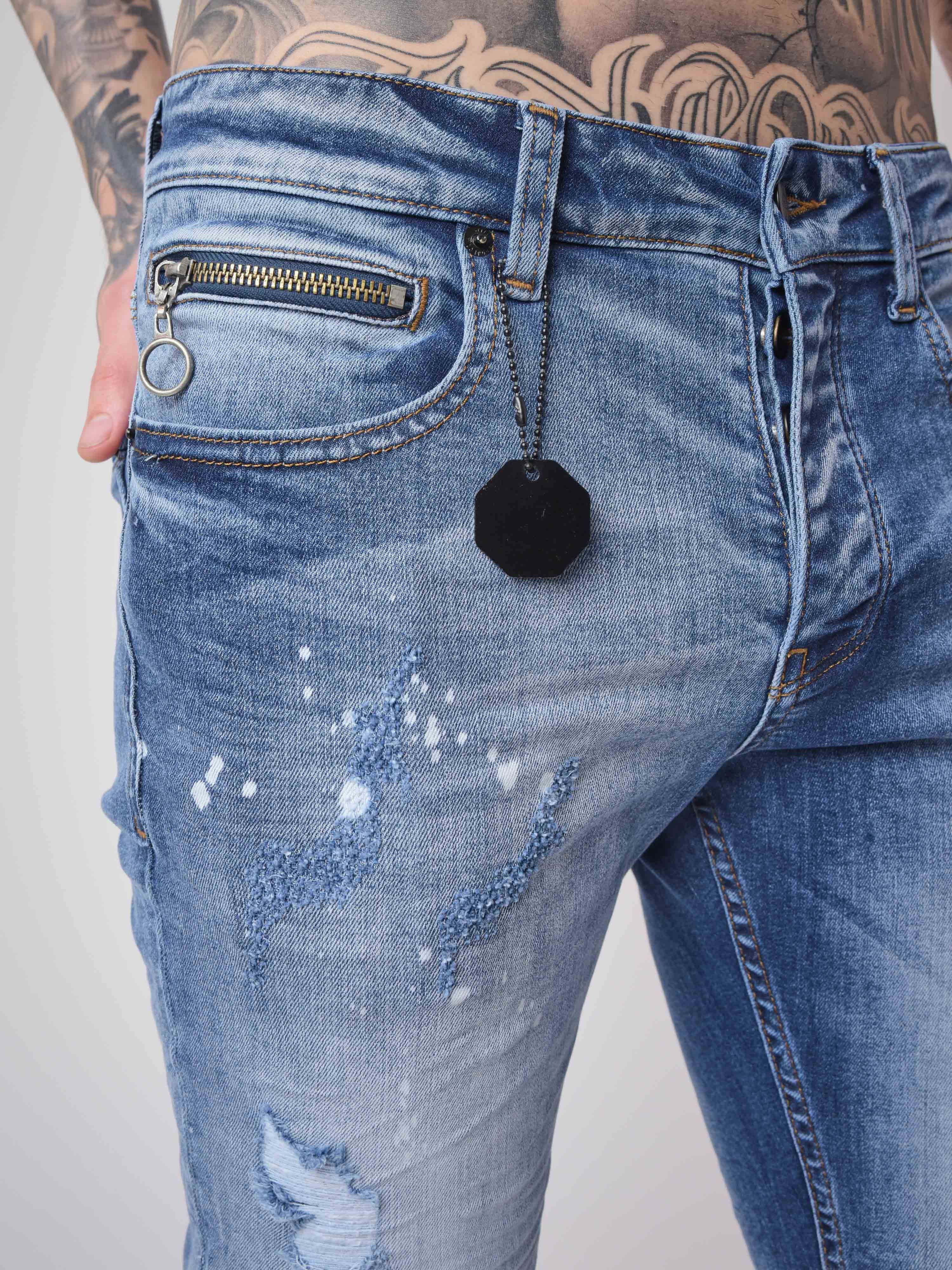 Skinny jeans with worn and scratched effect-3