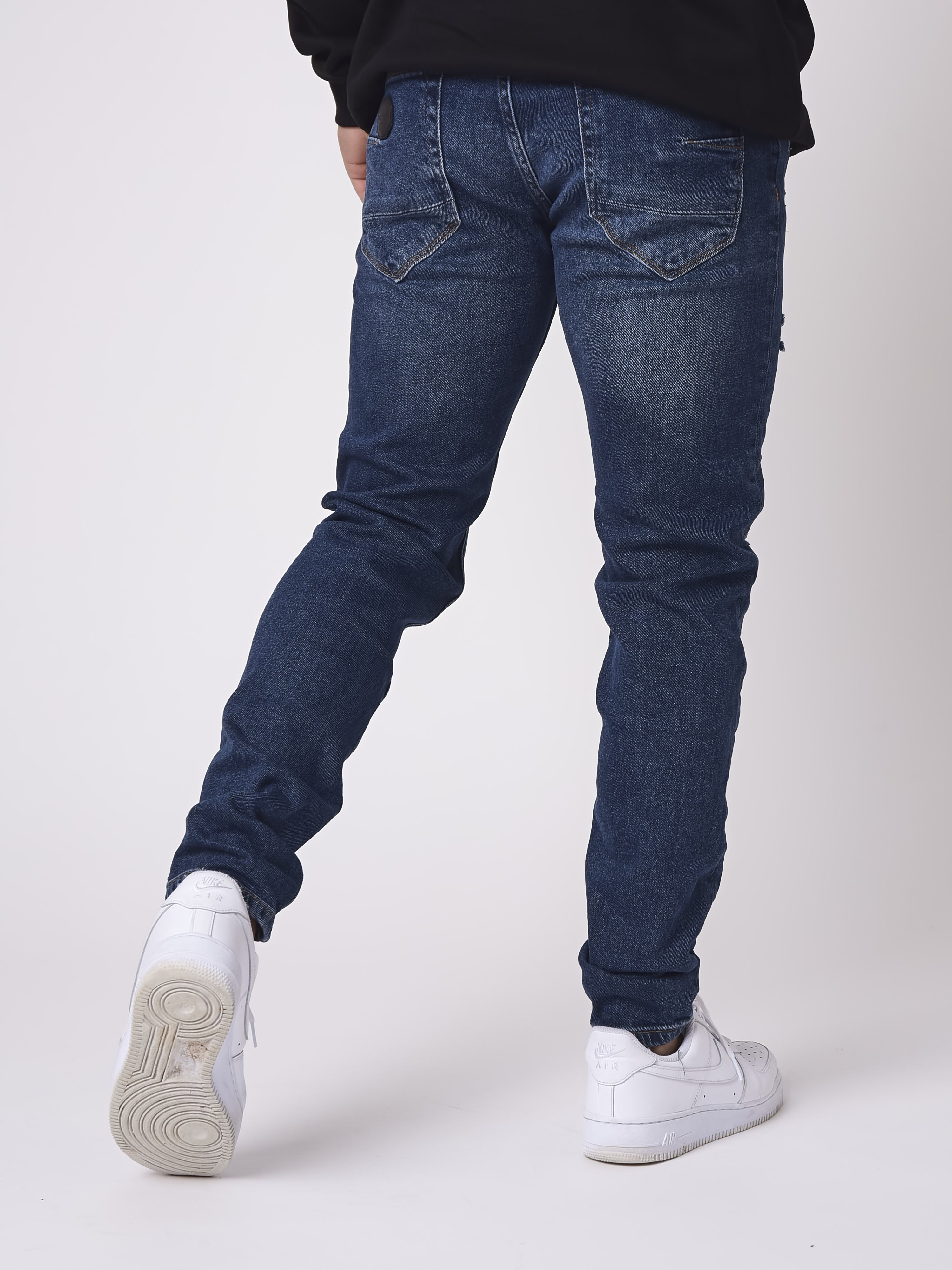 Jeans slim blu scuro effetto sabbiato e strappato-4
