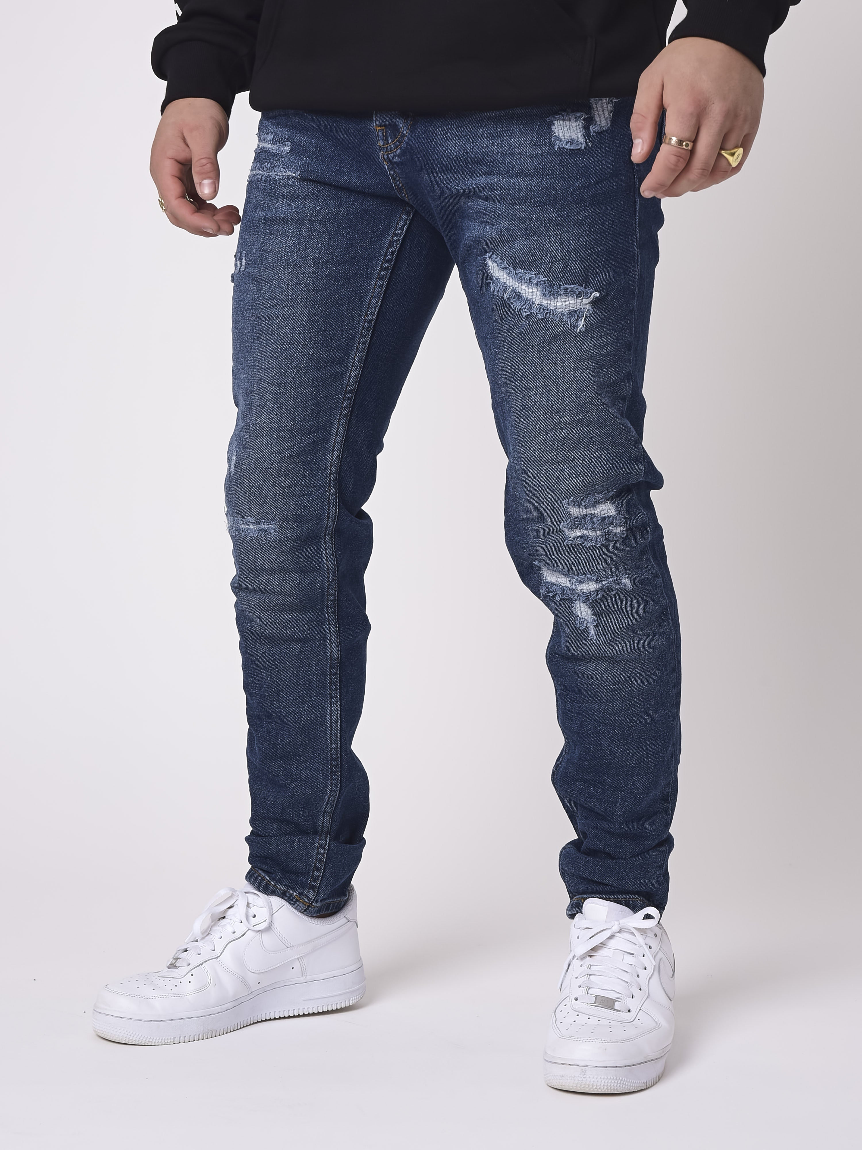 Jeans slim blu scuro effetto sabbiato e strappato – PXP
