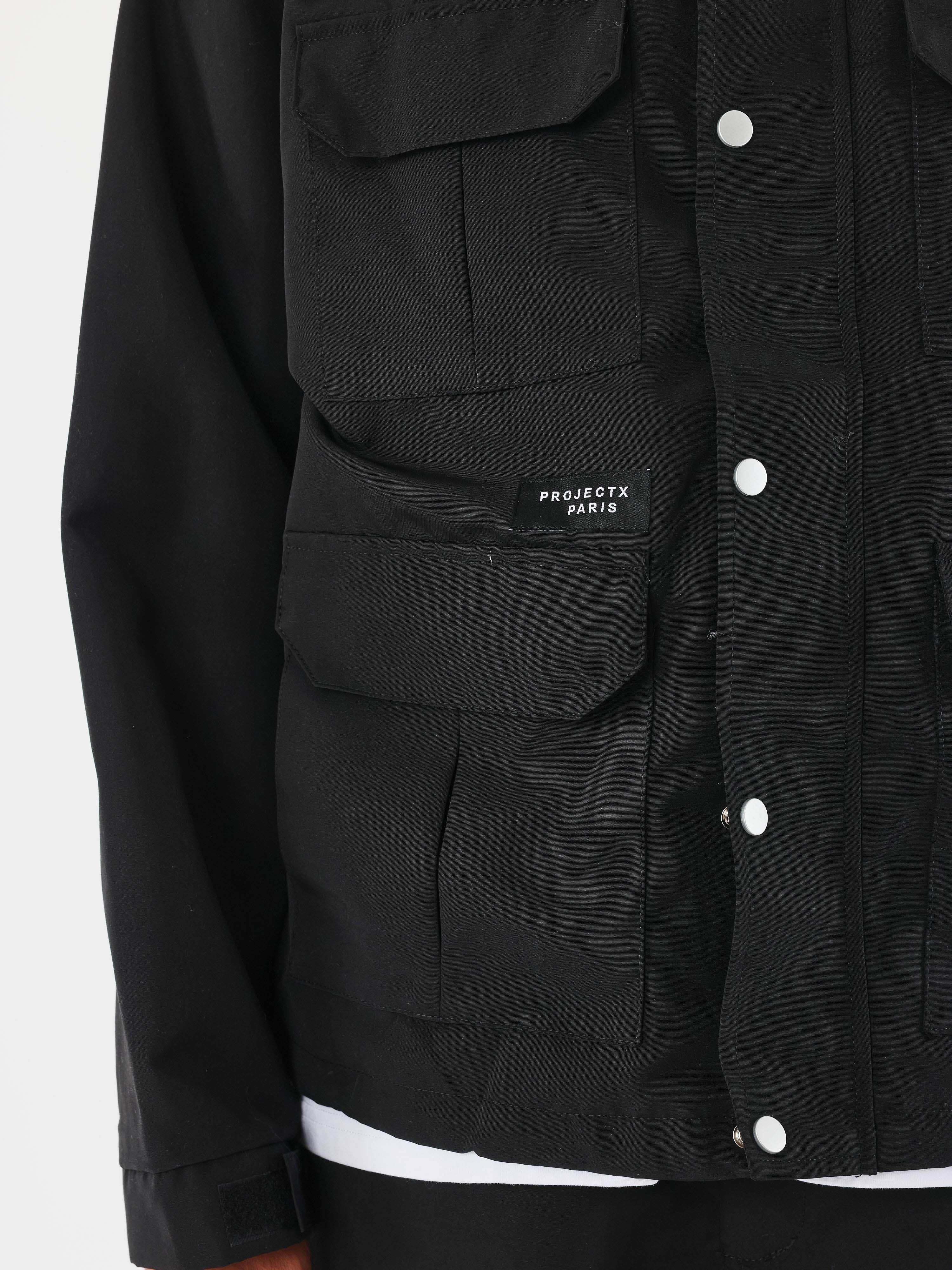 Chaqueta con capucha técnica-6