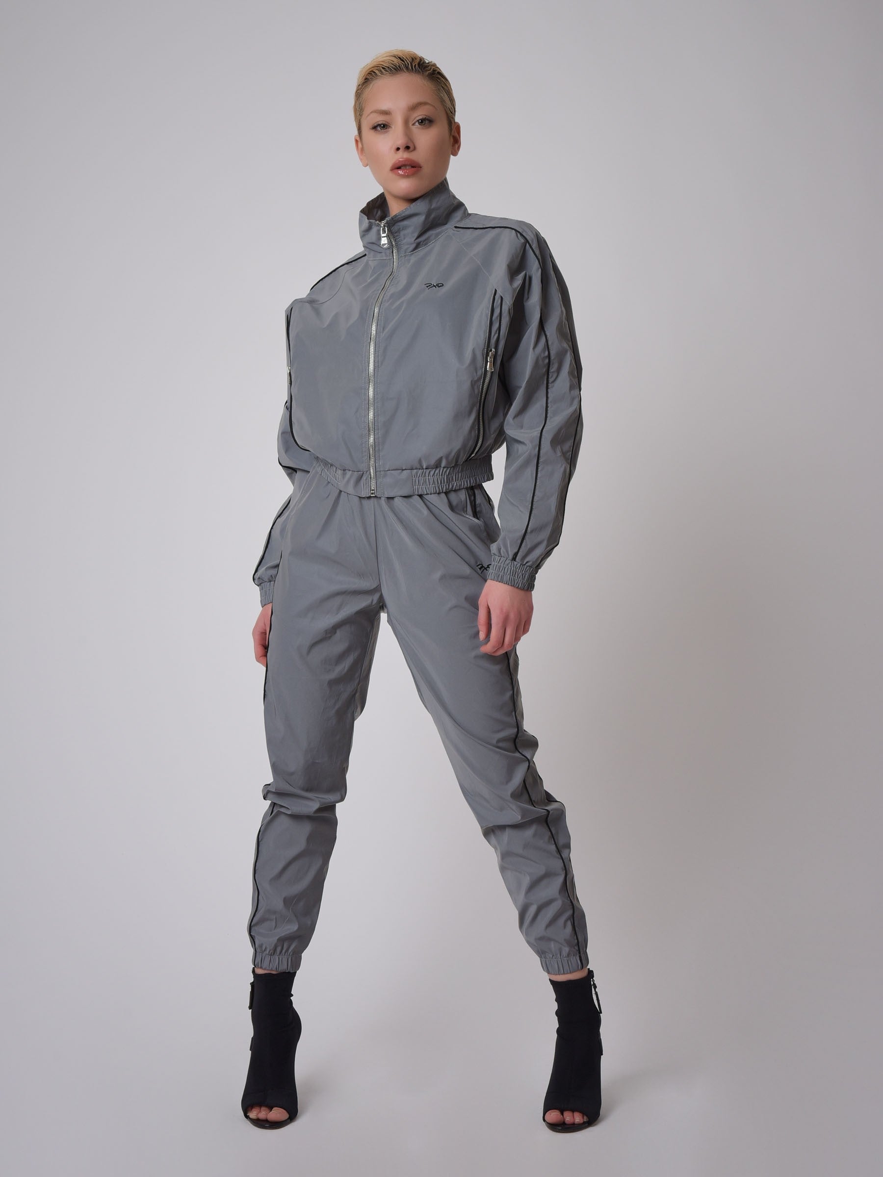 Oversized elasticated jacket with reflective stand-up collar and piping-4