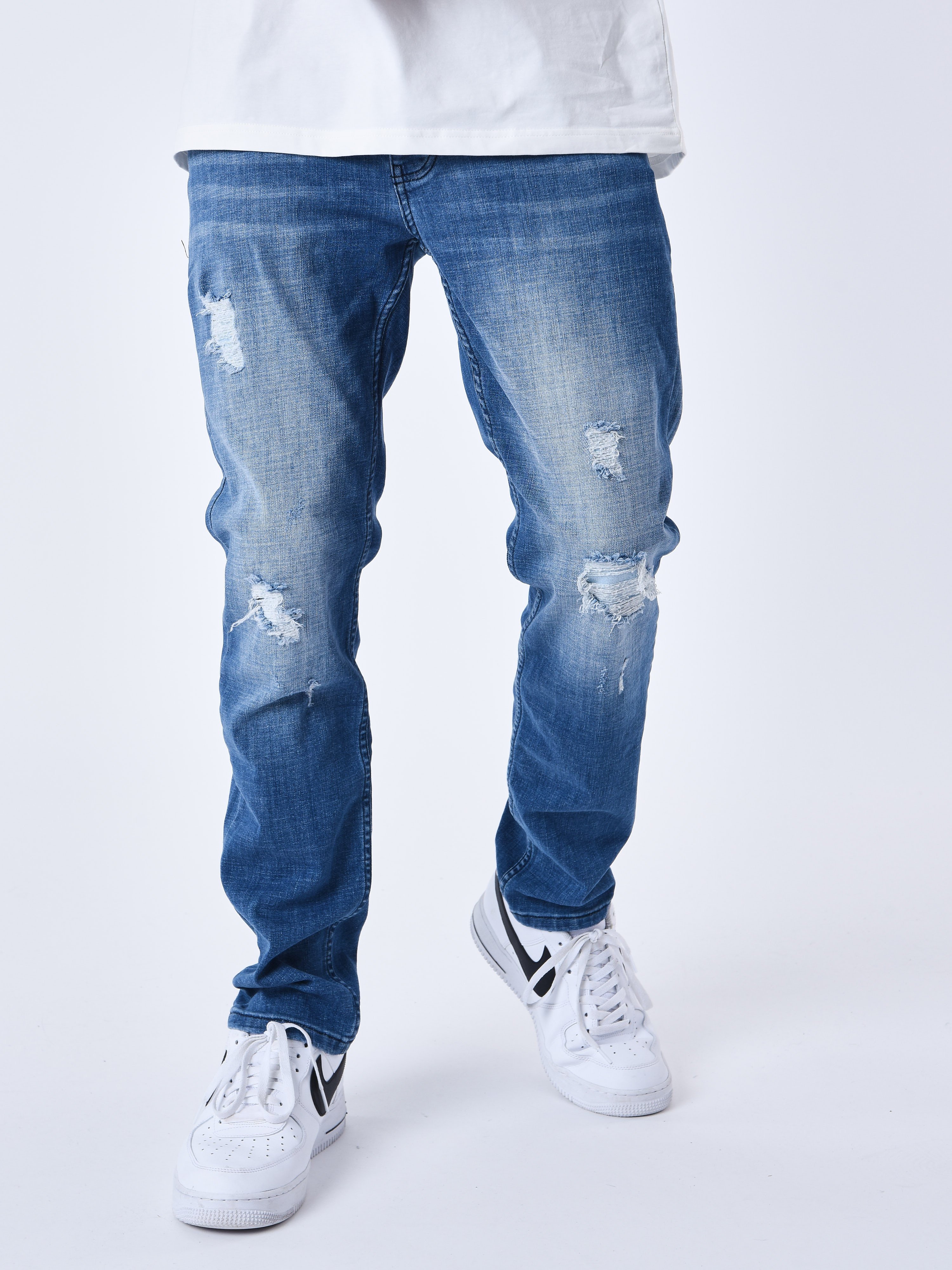 Jean regular dechire avec trous