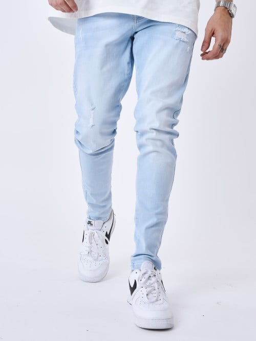 Jeans slim rotos con agujeros
