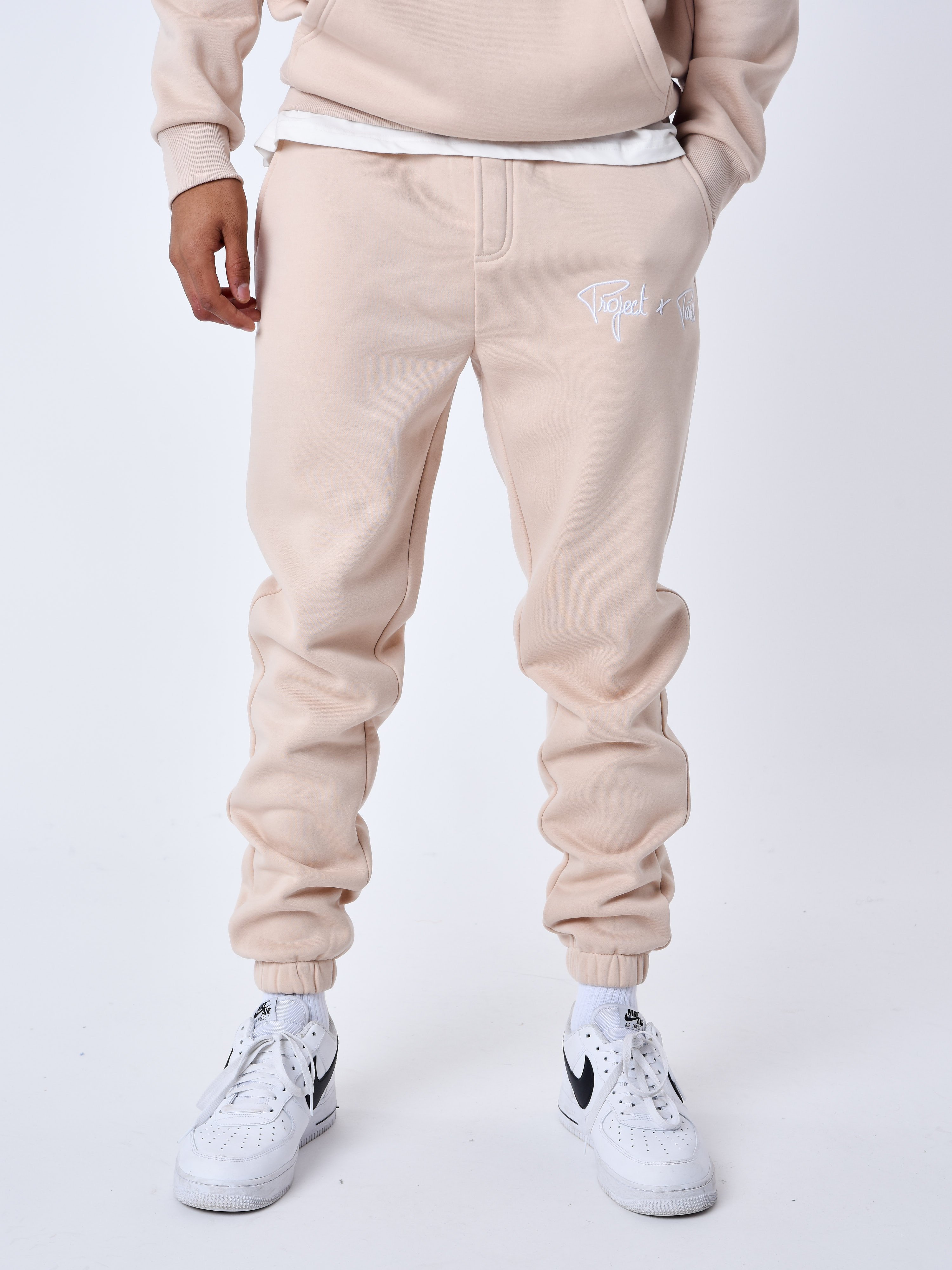 Jogger bottoms with elastic waistband featuring knitted logo