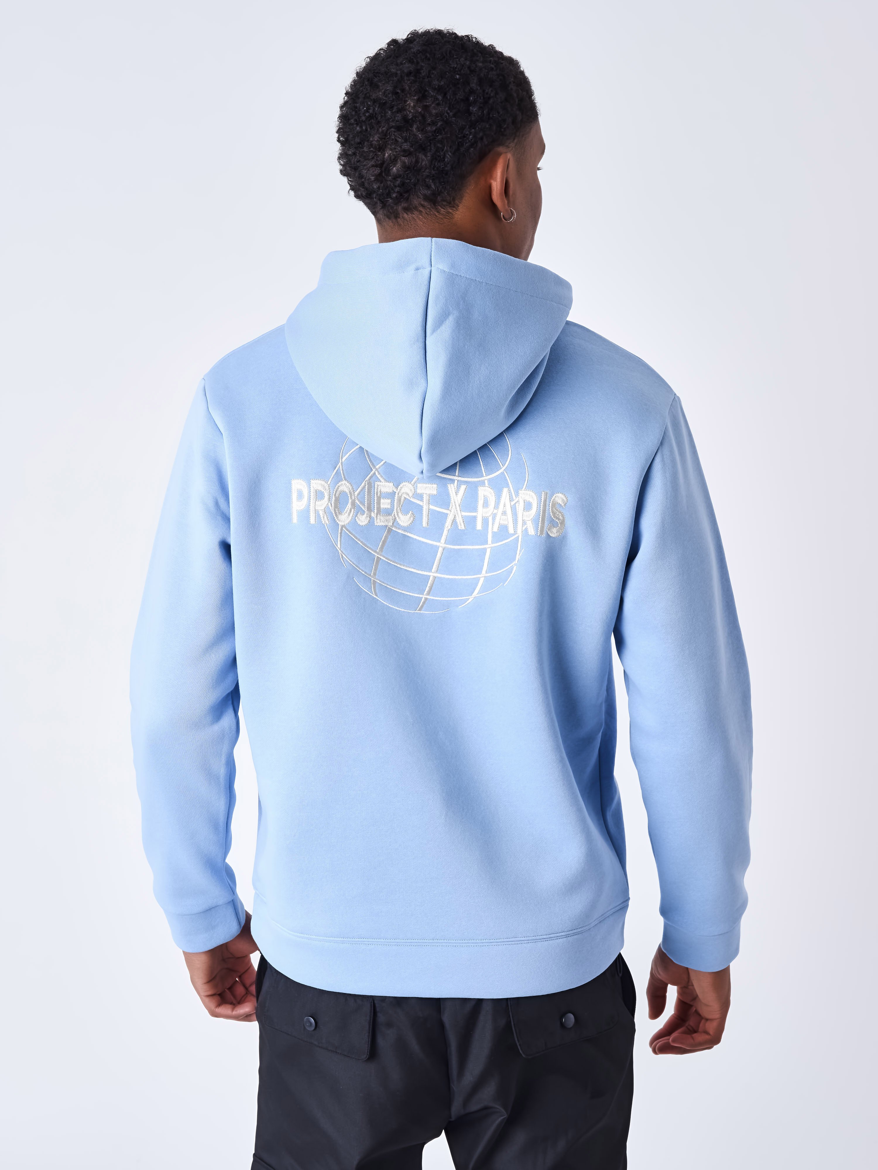 Sweat a capuche motif mappemonde